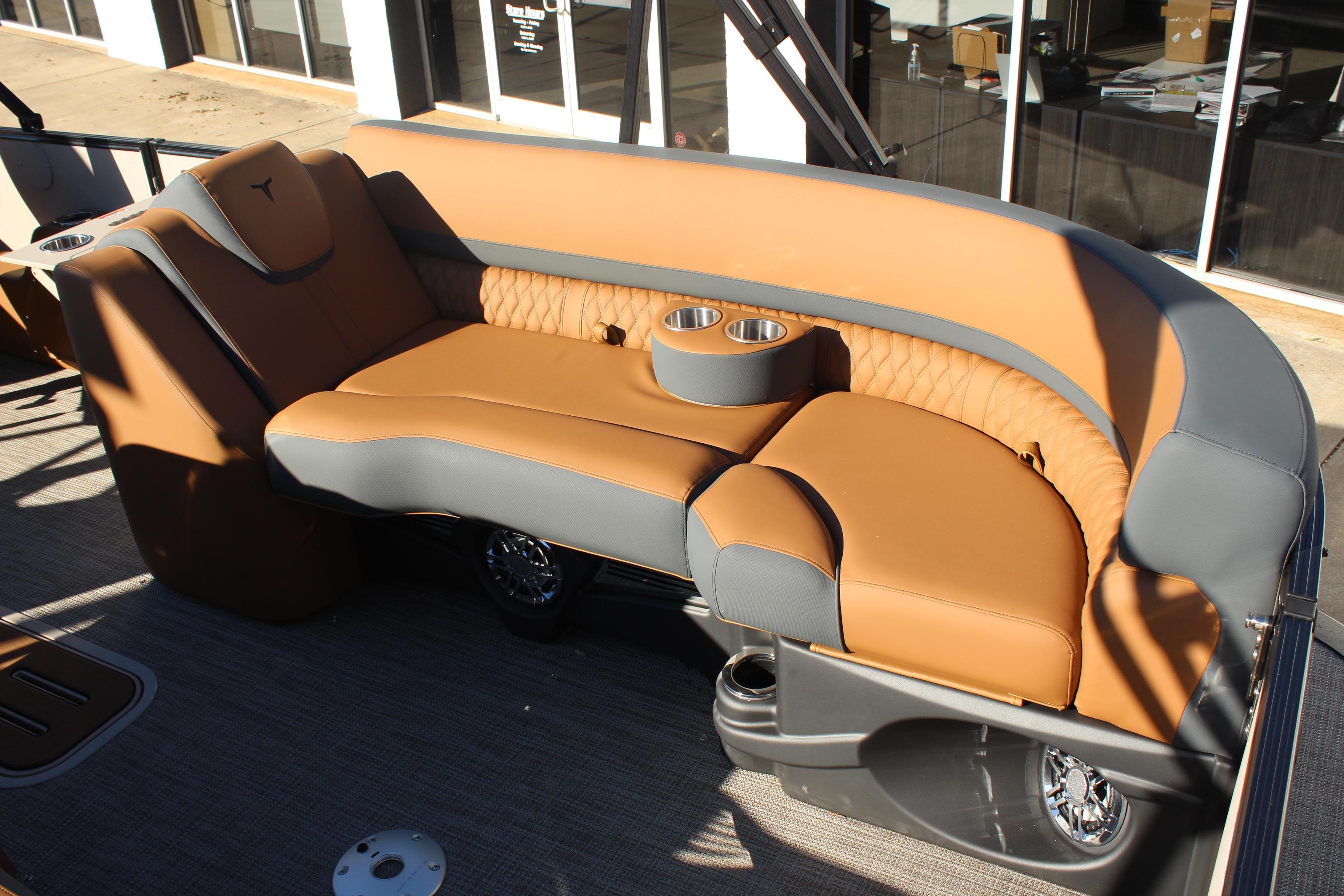 2026 Tahoe Pontoon Cascade Versatile Rear Bench with tan and gray seating, cup holders.