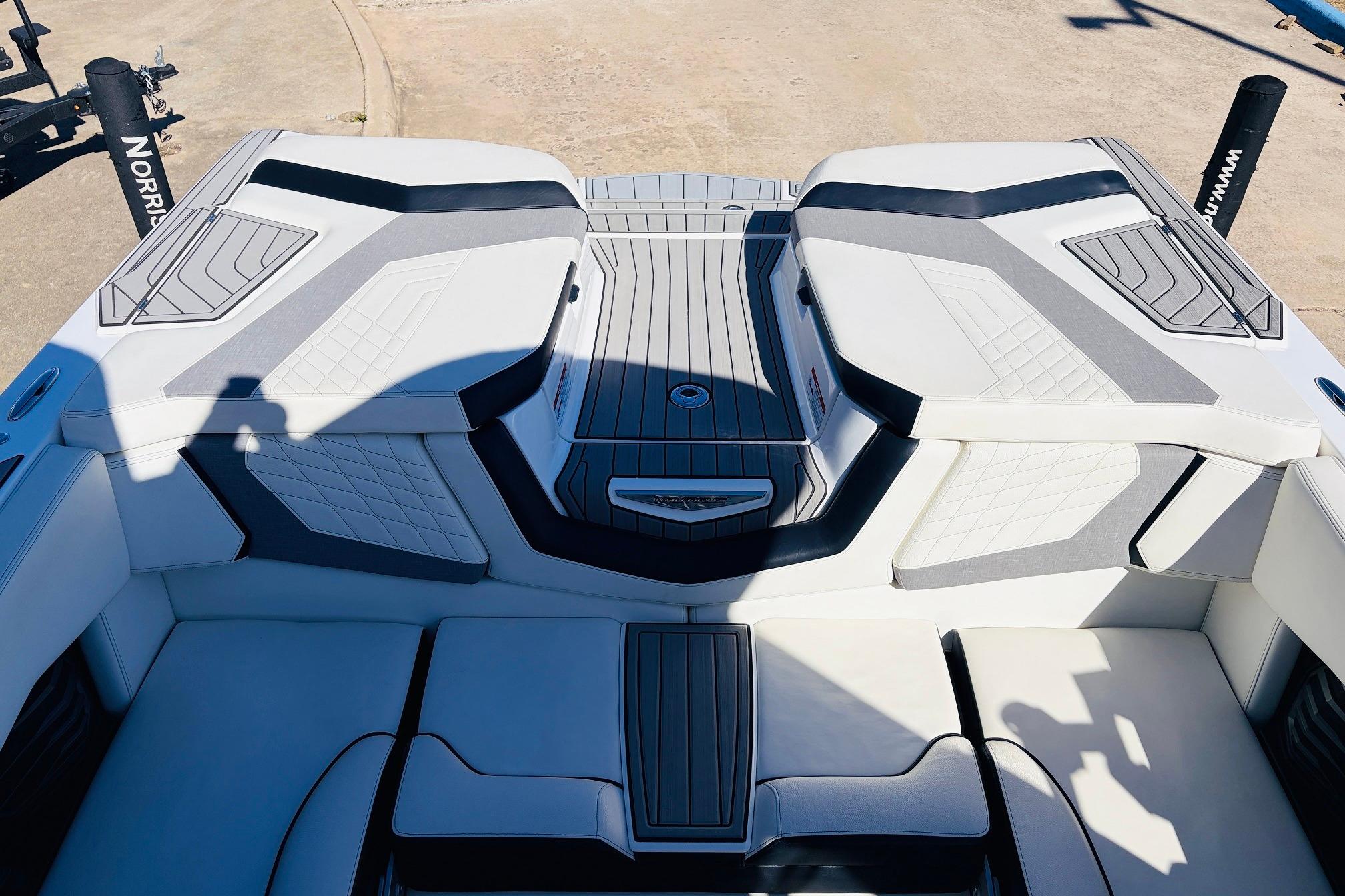 2023 Nautique Super Air Nautique G25 boat interior with sleek seating and modern design.