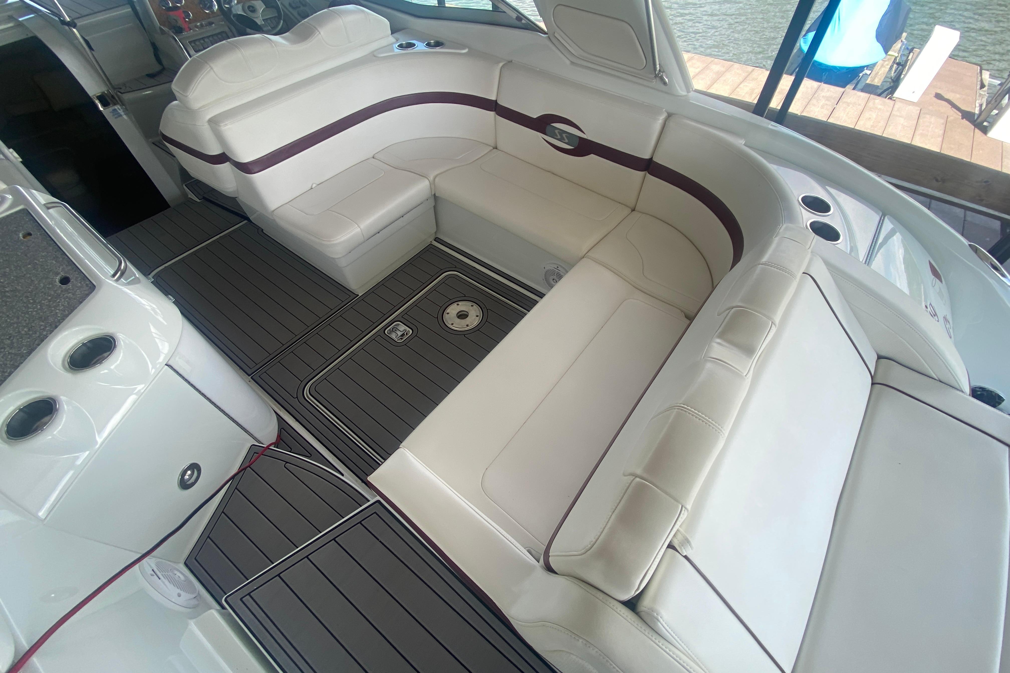 2007 Formula 310 Sun Sport boat interior with white seating and sleek design.