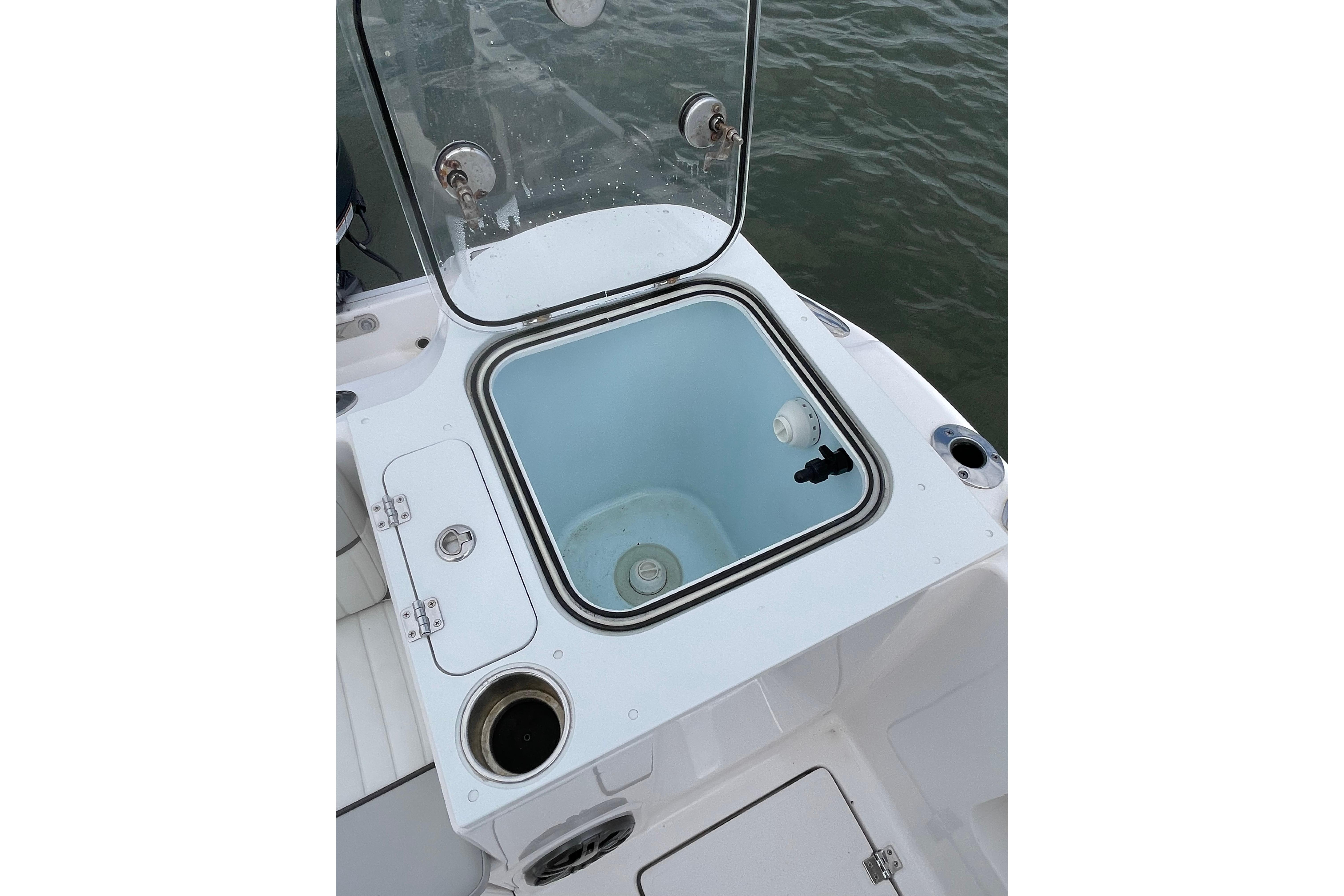 2023 Sea Fox 268 Commander livewell with open lid, showcasing interior design.