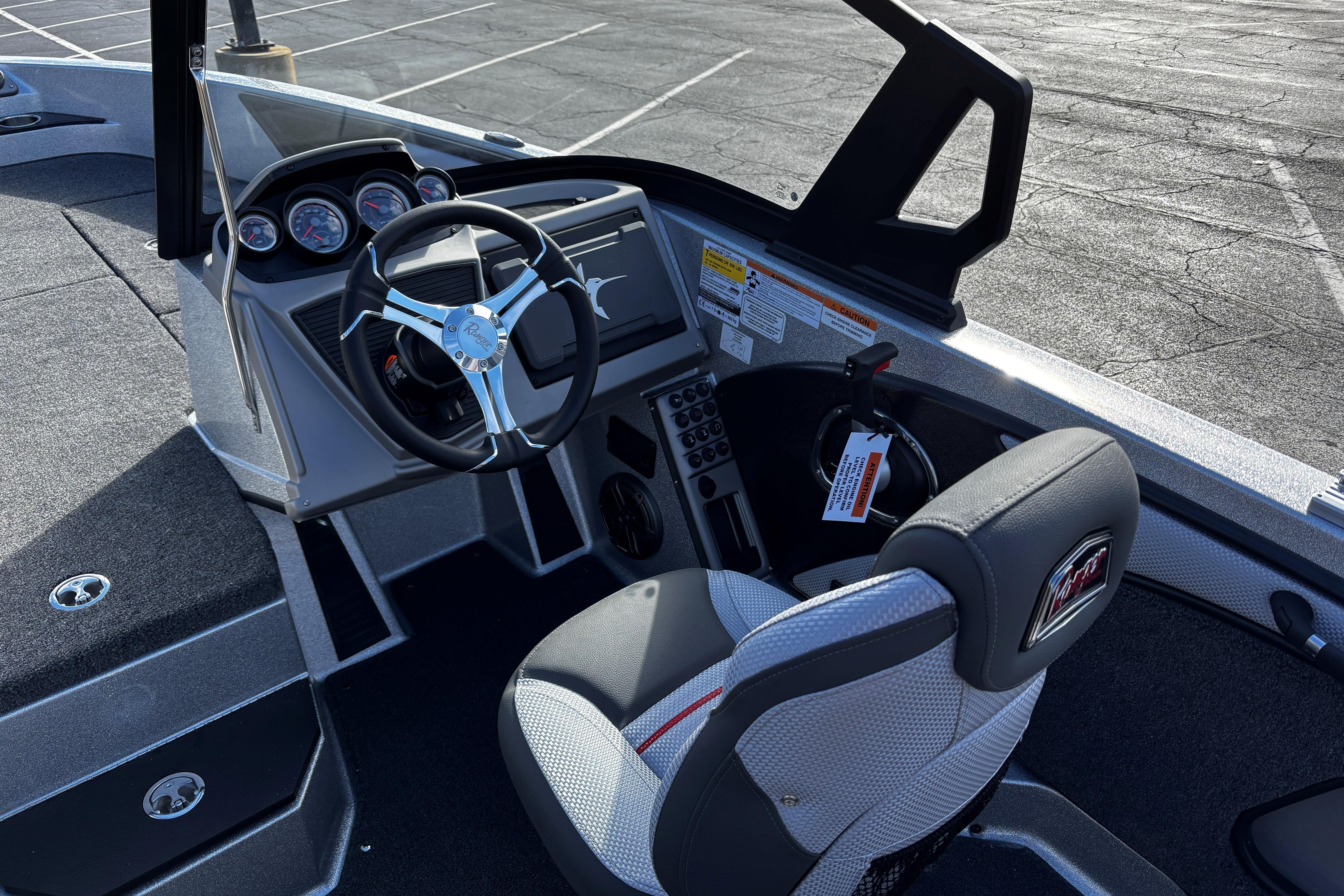 2026 Ranger 1880MS boat interior with steering wheel and dashboard controls.