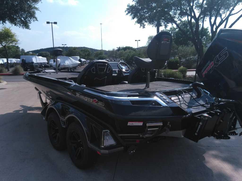2025 Ranger Z521R Cup-Equipped boat in a parking lot, showcasing sleek design and features.
