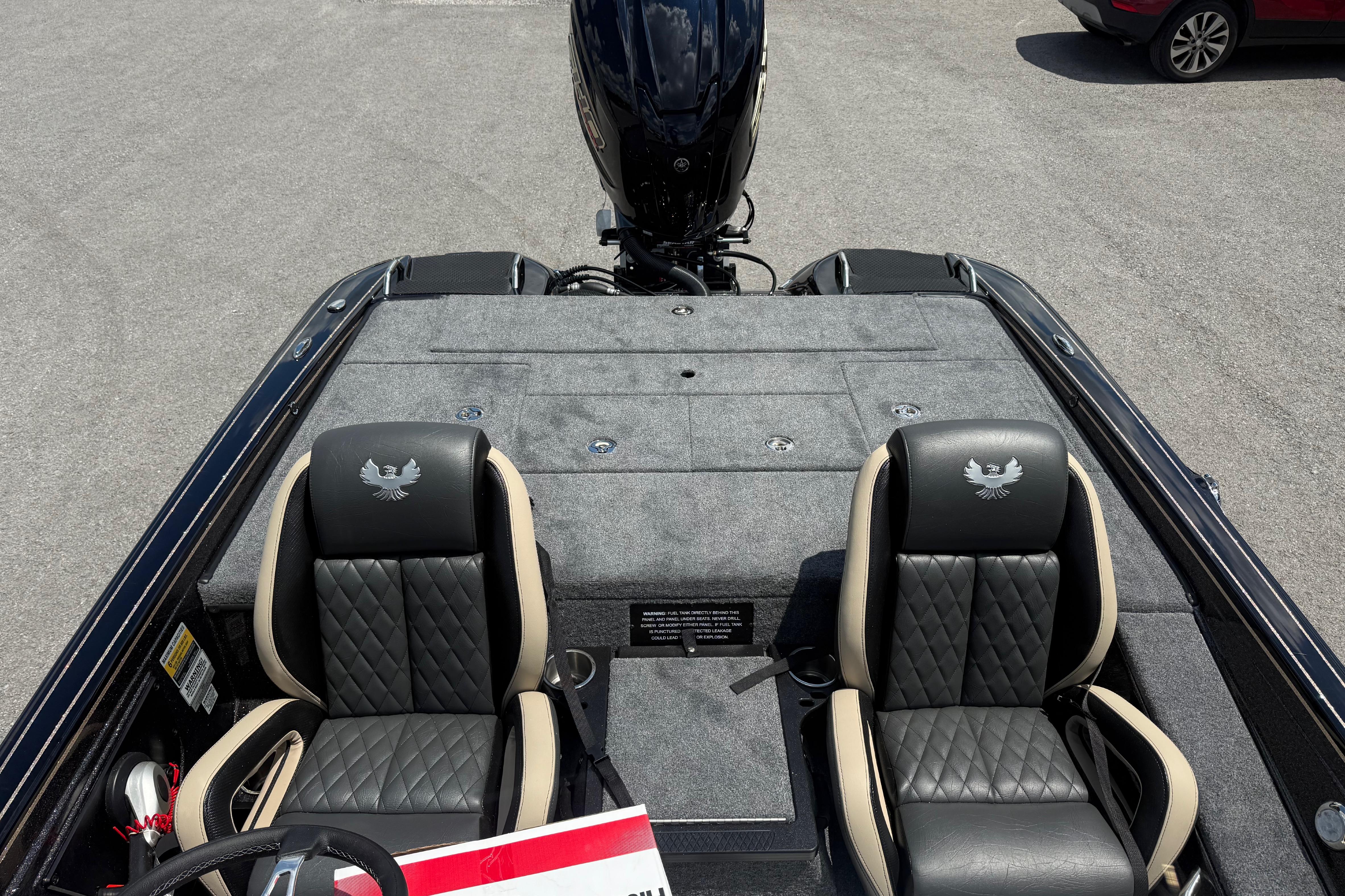 2027 Phoenix 721 ZXL boat interior with dual seats and engine view.