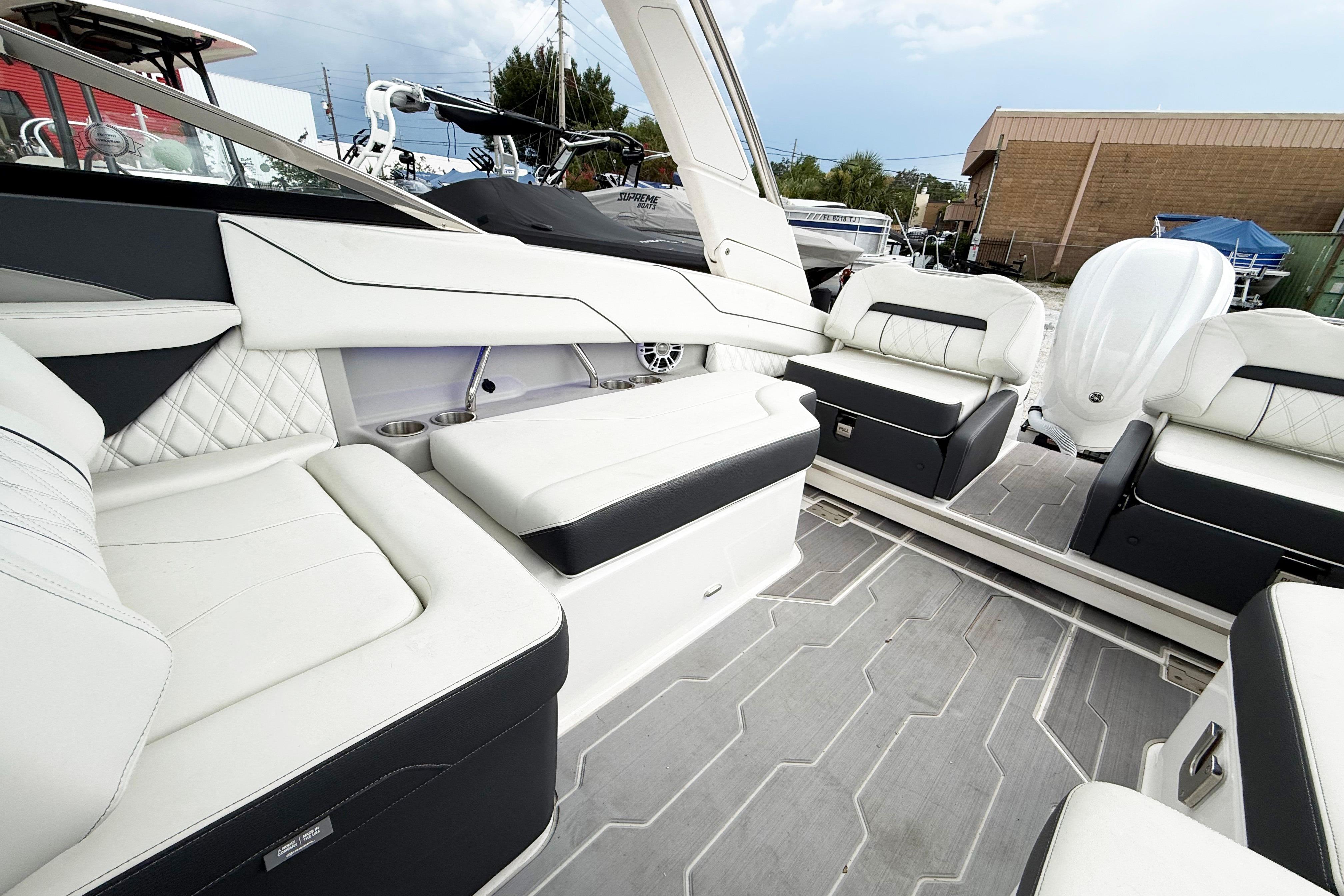 Luxurious interior of 2024 Regal LX4 boat with plush seating and modern design.