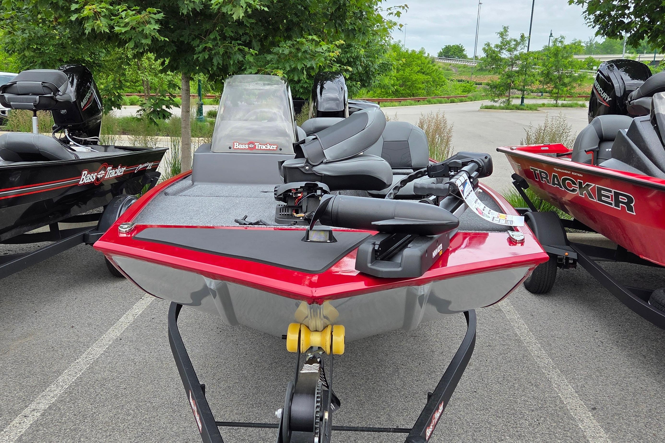 2026 Tracker Bass Tracker Classic XL boat, red, parked outdoors on a trailer.