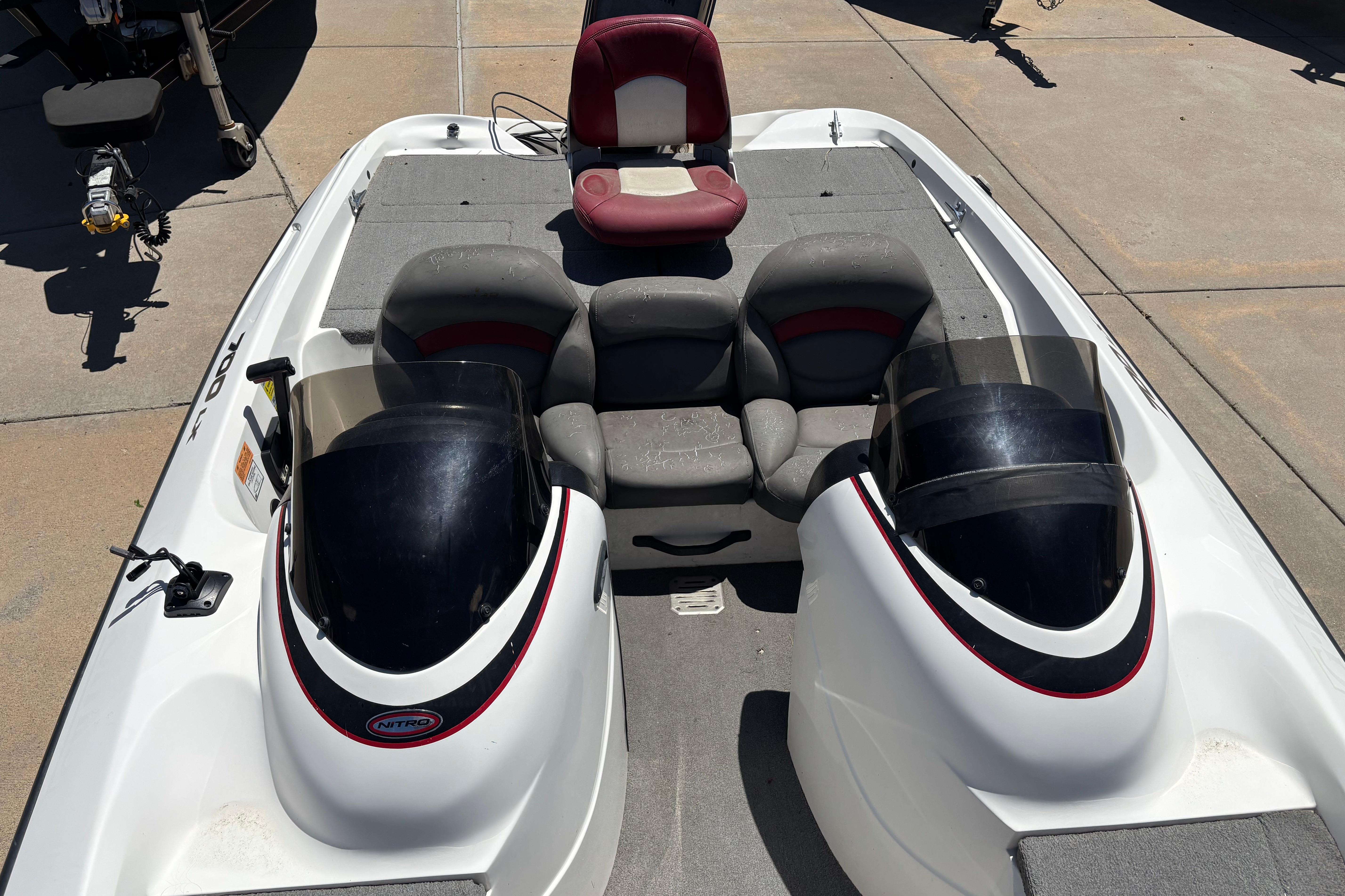 1998 Nitro 700 LX DC boat interior with dual consoles and seating arrangement.
