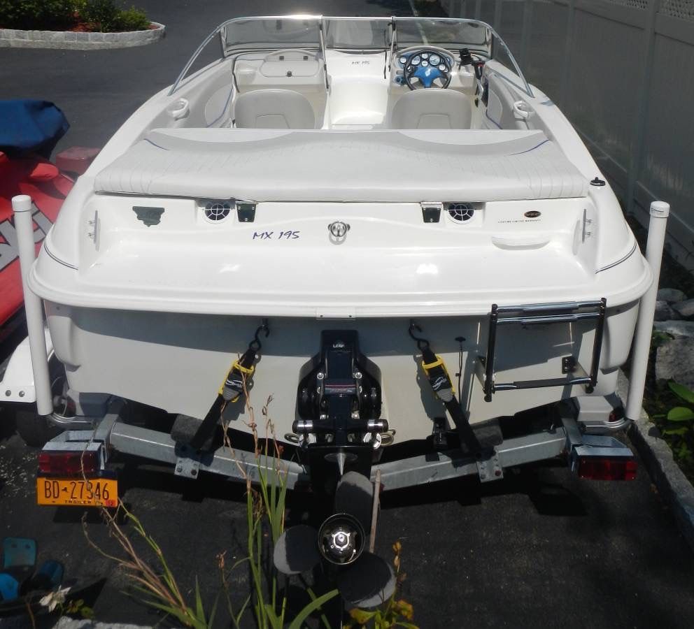 The image shows a white 2006 Glastron MX-195 Limited Edition boat on a trailer.