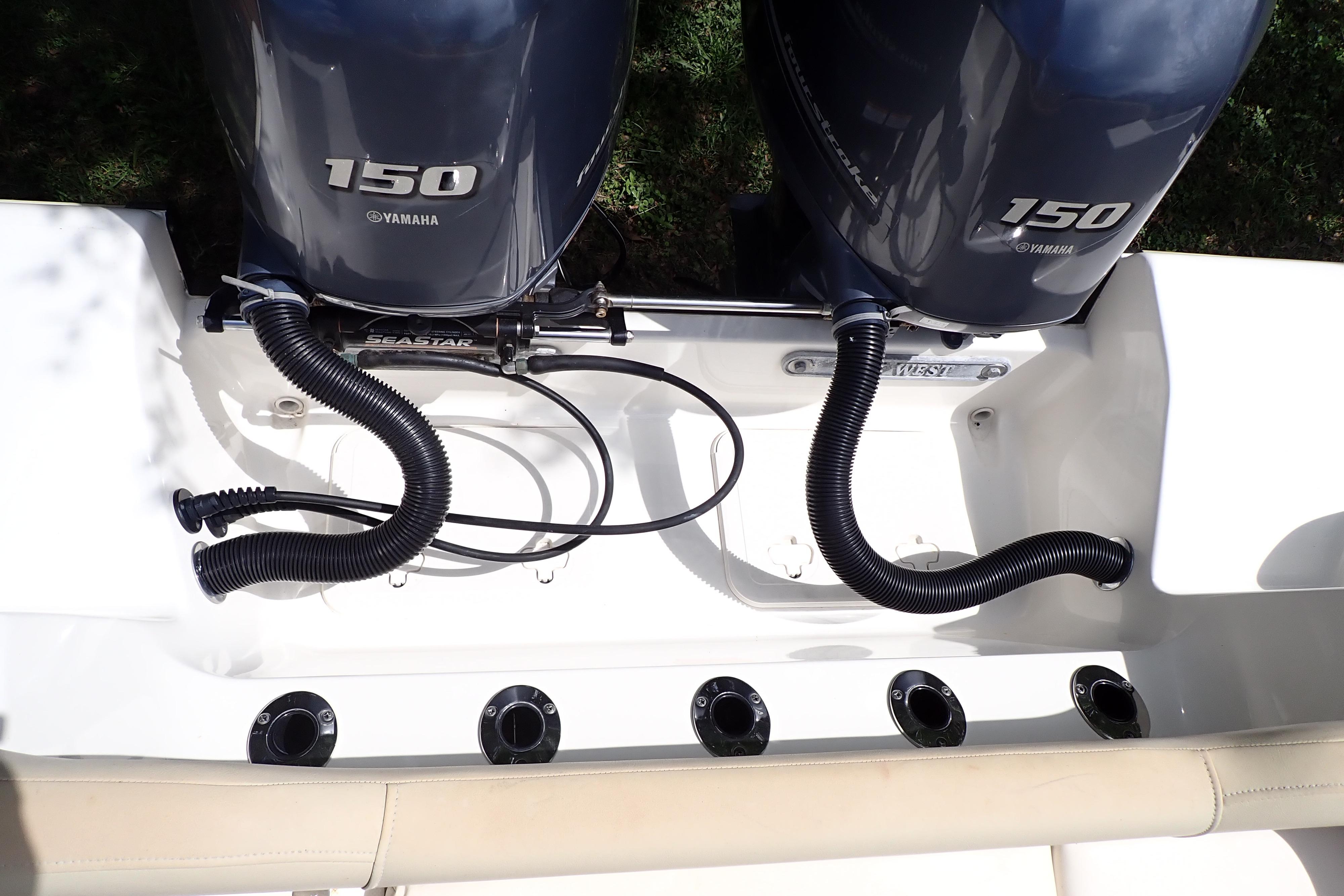 2019 Key West 263 FS boat with dual Yamaha 150 engines and SeaStar hydraulic steering.
