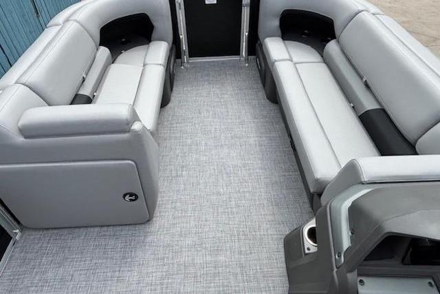 2026 Sun Tracker Party Barge 20 DLX interior with spacious seating and modern design.
