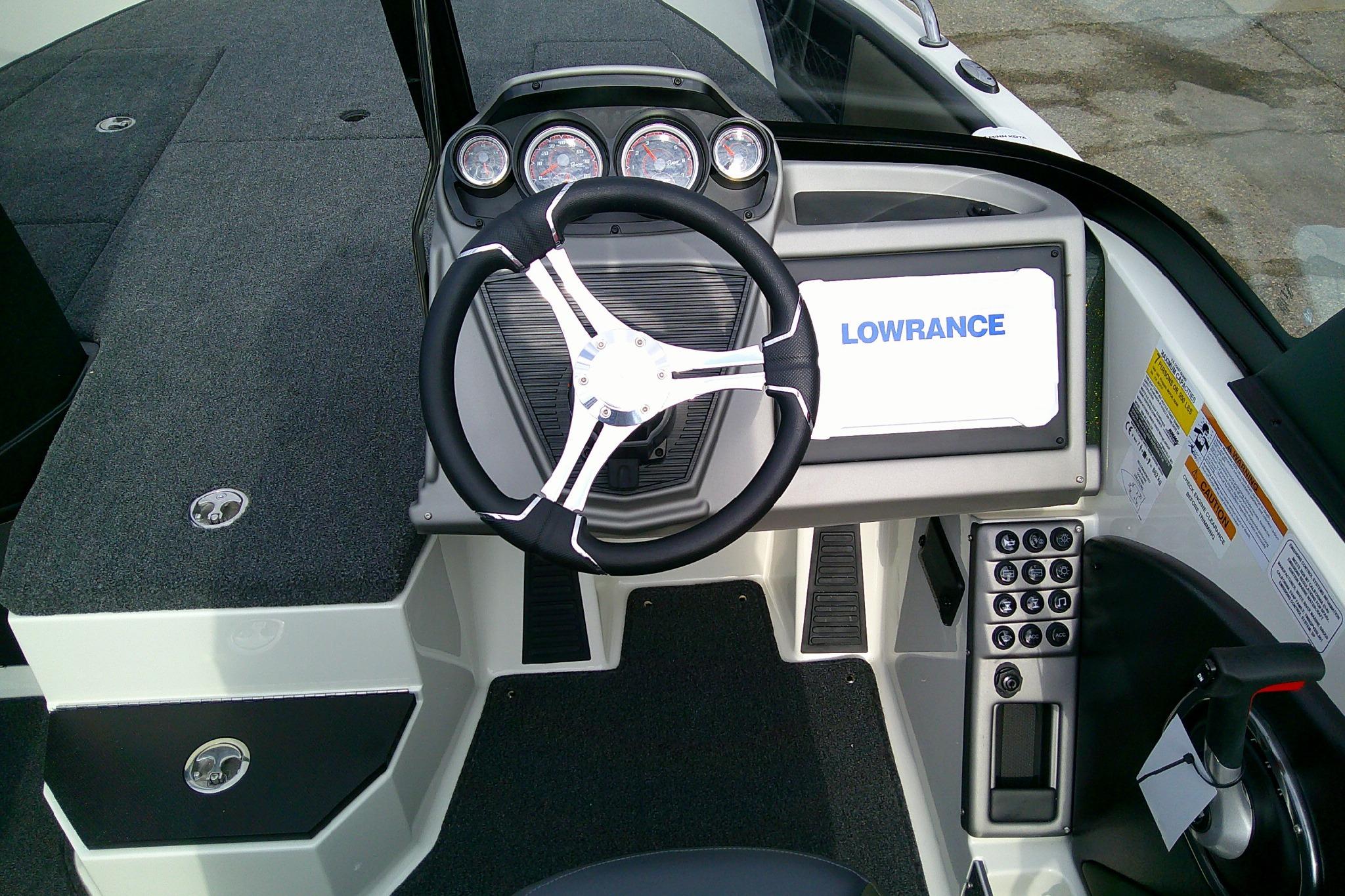 2026 Ranger 1880MS boat dashboard with steering wheel and Lowrance display.