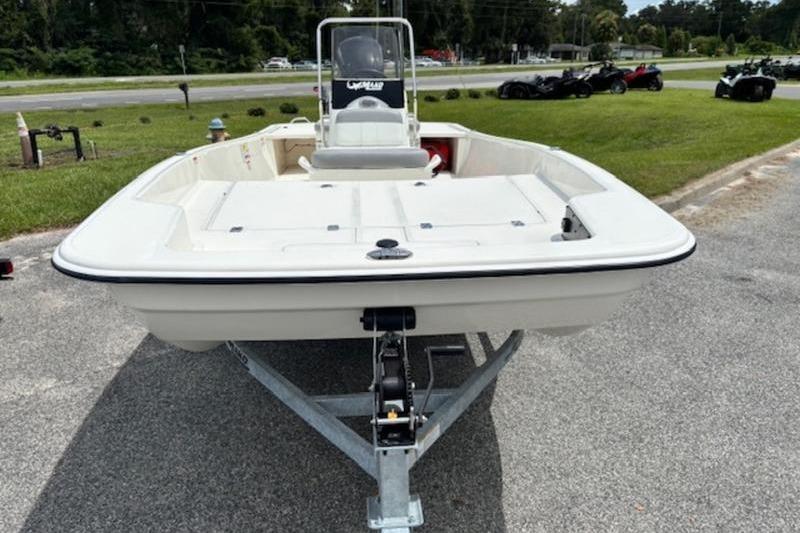 2026 Mako Pro Skiff 17 CC boat on trailer, parked outdoors.