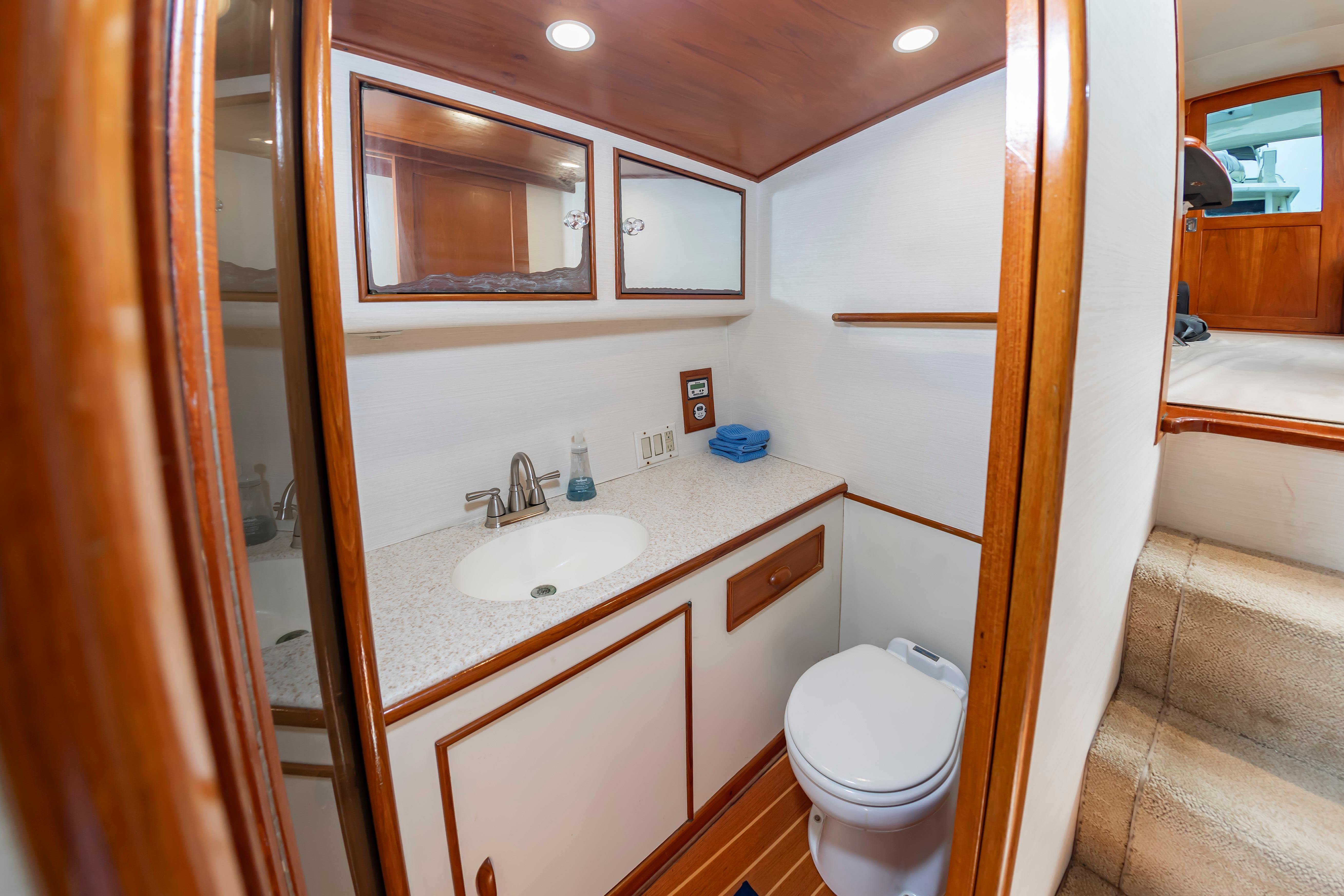 Luxurious bathroom interior of 1993 Custom Carolina Scarborough 56 Convertible yacht.