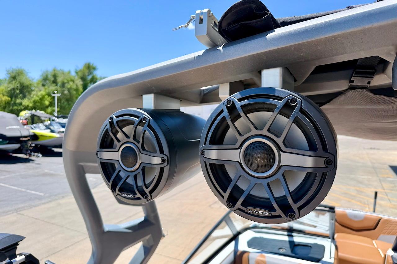 Speakers on a 2021 Nautique Super Air Nautique G23 boat, sunny day background.