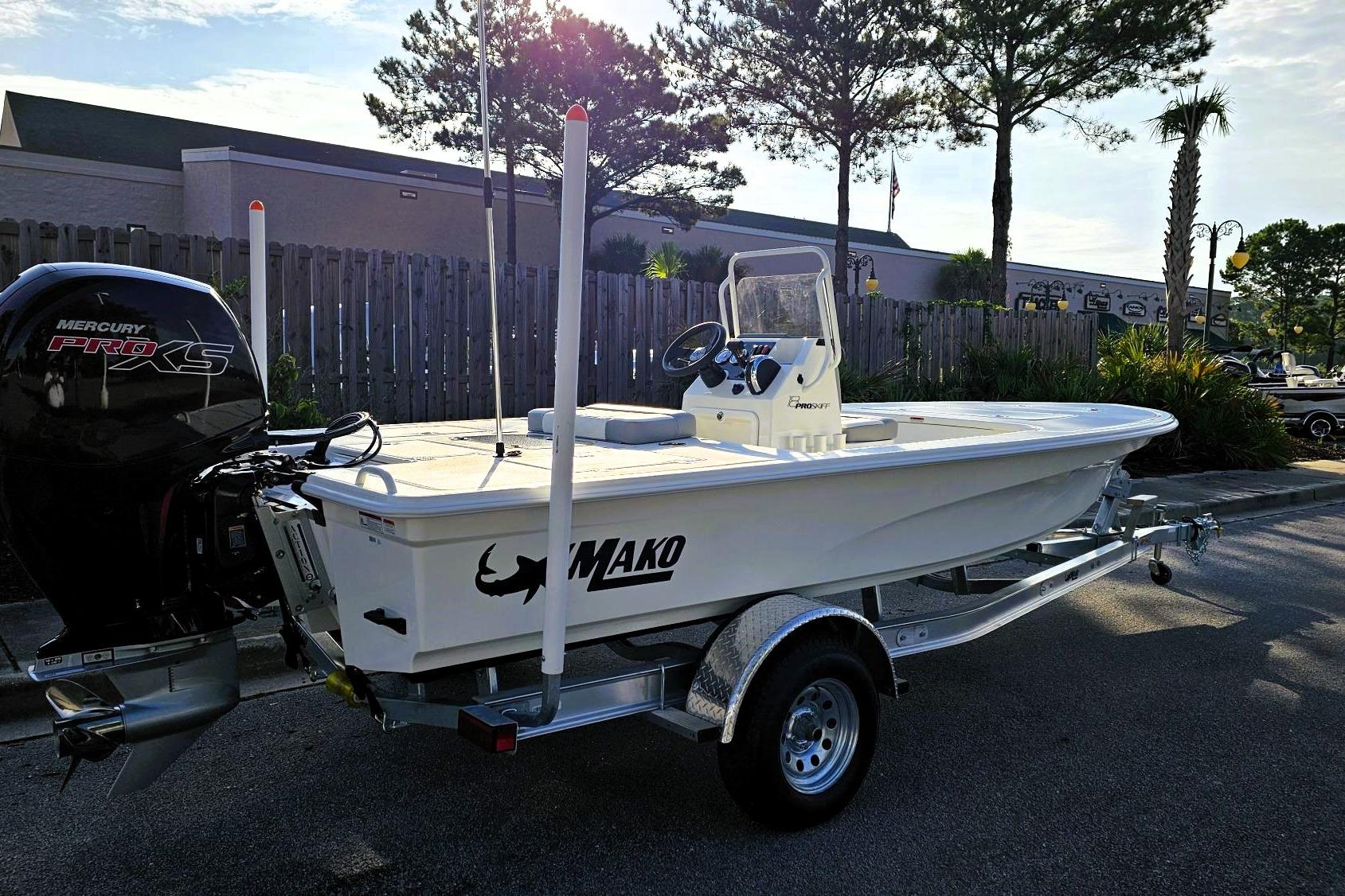 2026 Mako 18 Pro Skiff boat on trailer, featuring Mercury Pro XS engine.