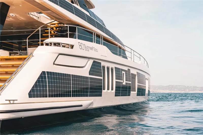 2026 Sunreef 80 Sunreef Power yacht with solar panels on the water.