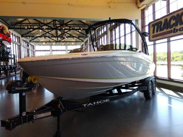2023 Tahoe 210 Si Limited boat on display in showroom.