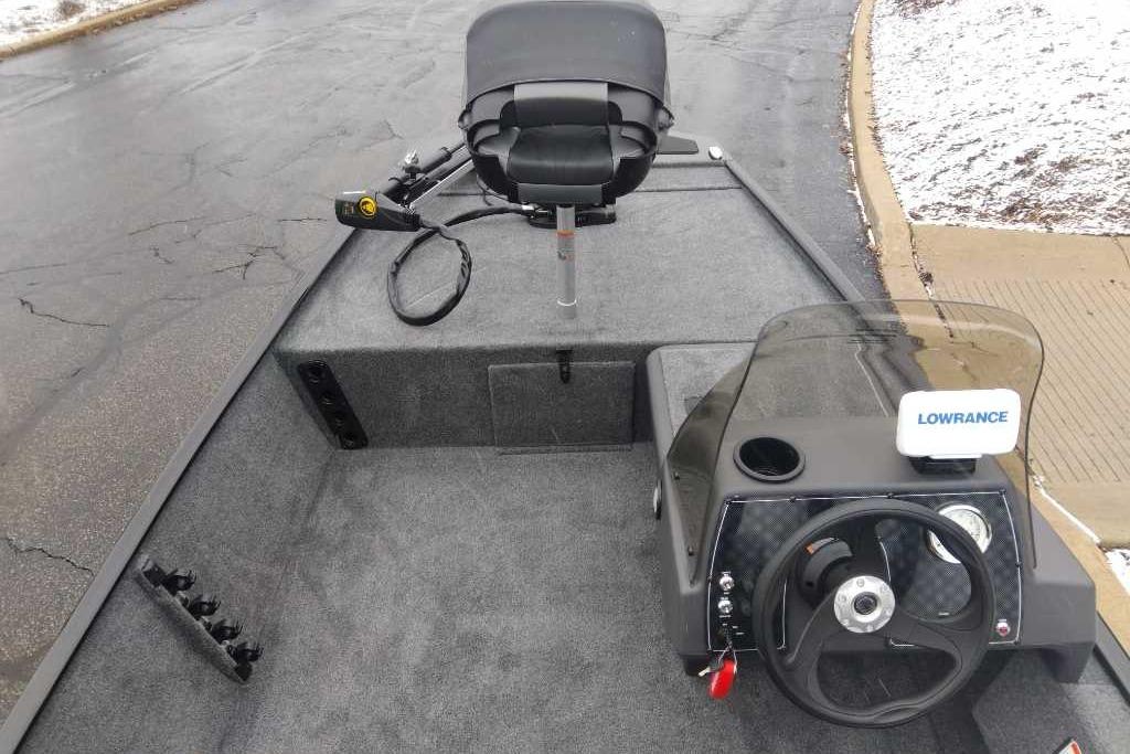2026 Tracker Bass Tracker Classic XL boat interior with steering wheel and Lowrance system.