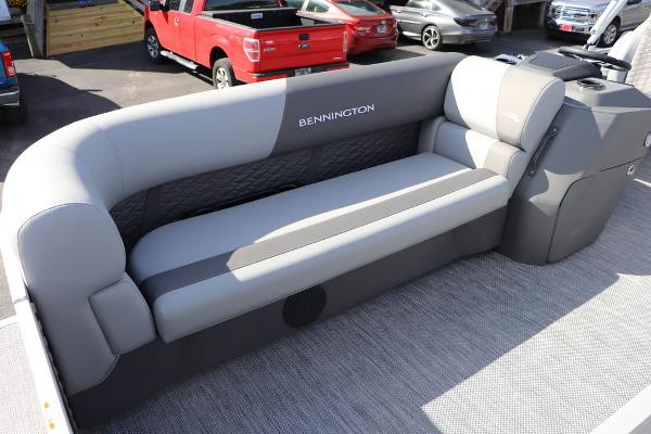 2024 Bennington 20 SL pontoon boat with sleek gray seating.