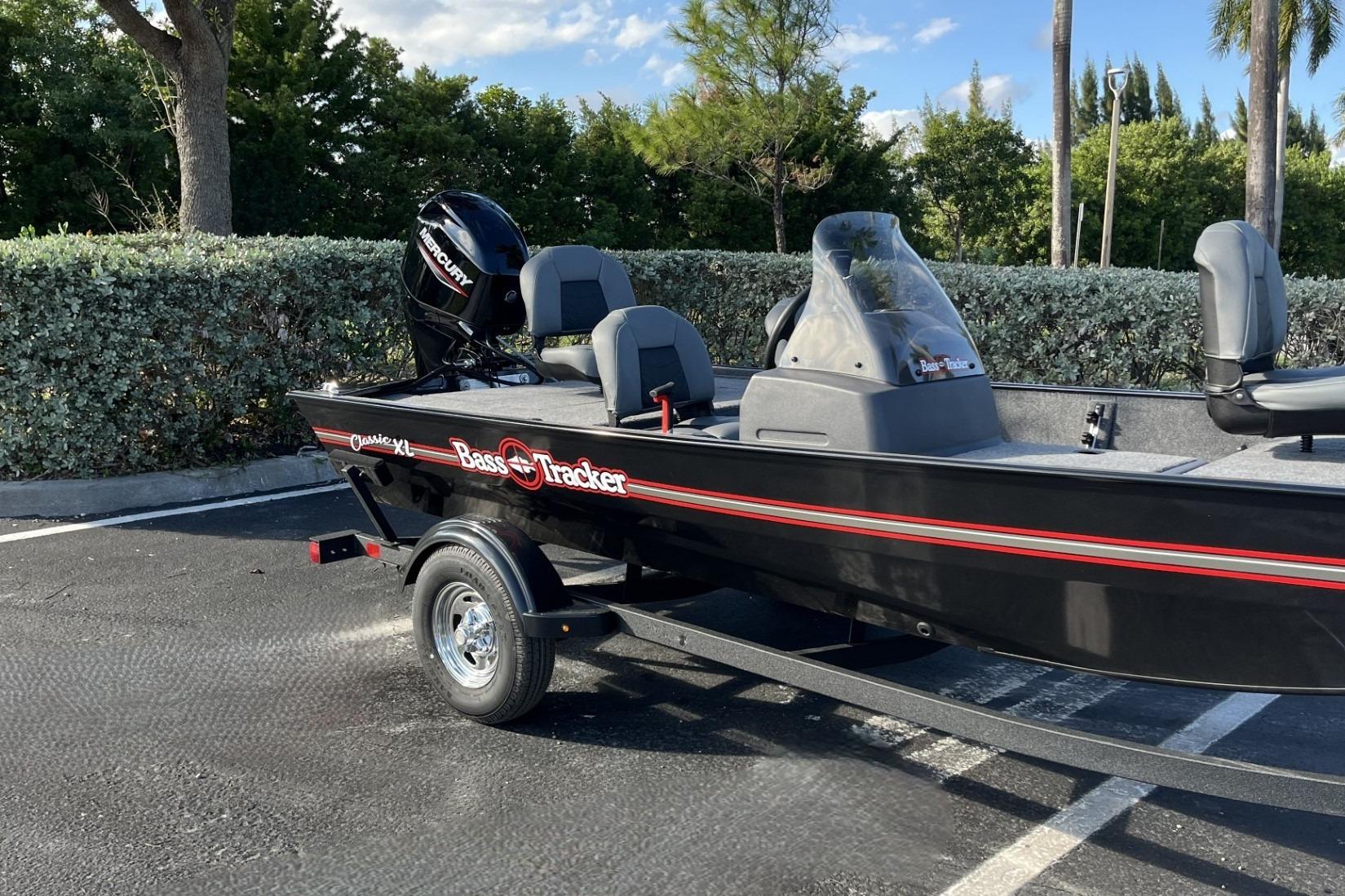 2026 Tracker Bass Tracker Classic XL boat parked outdoors on a trailer.