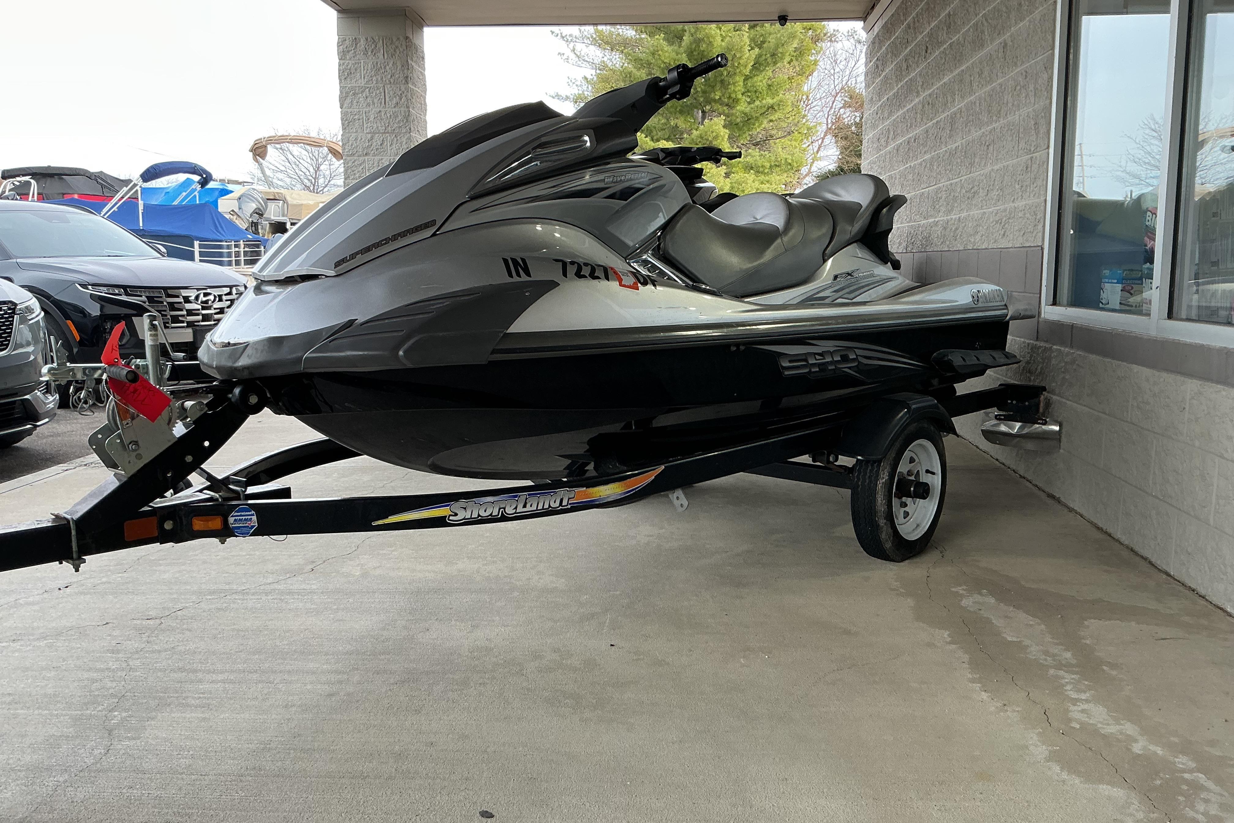 2008 Yamaha WaveRunner FX Cruiser SHO on trailer, parked in a garage.