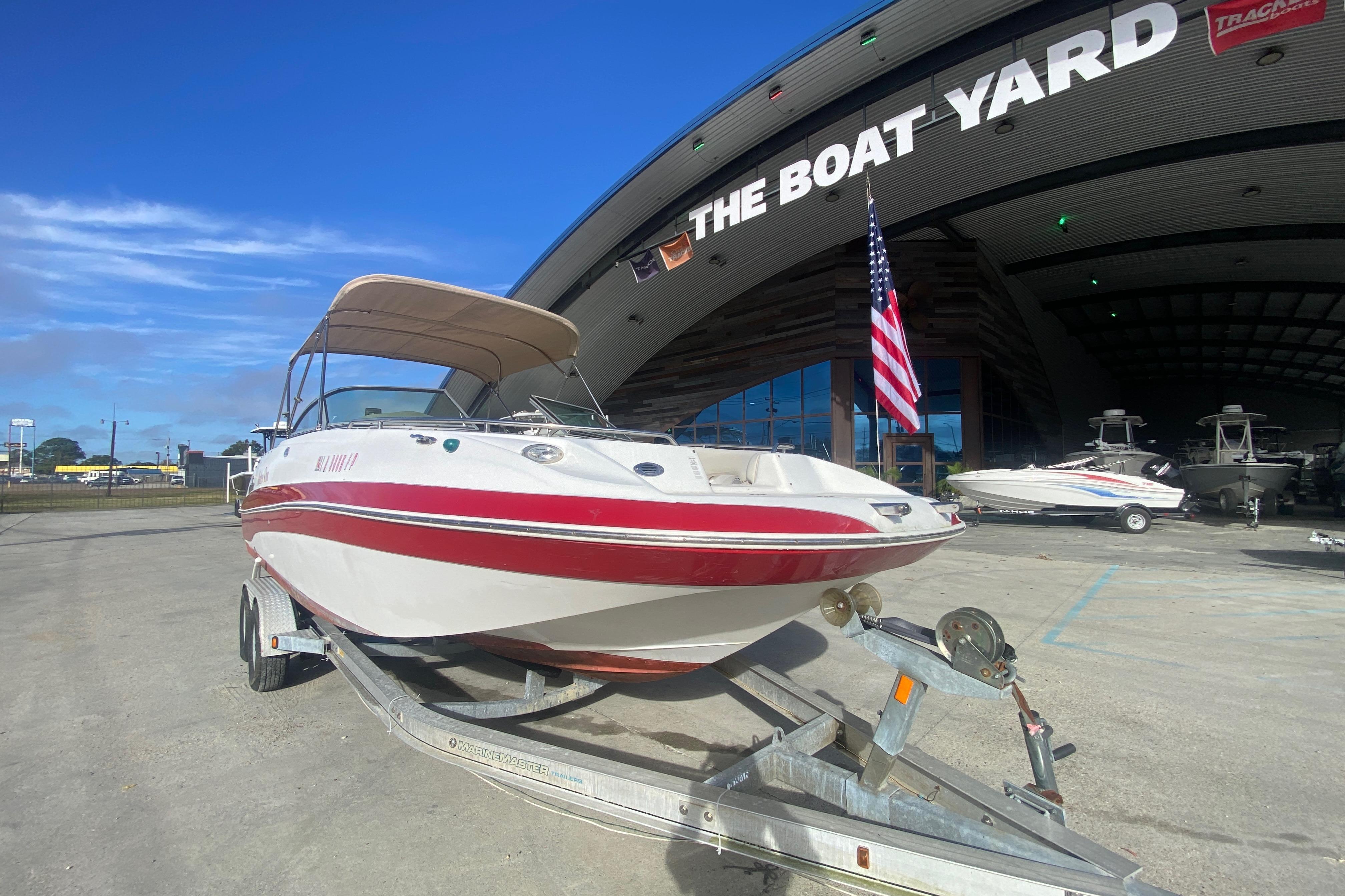 2007 NauticStar 230DC Sport Deck boat on trailer at The Boat Yard.