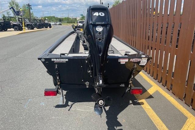 2019 Tracker Panfish 16 boat with 40 HP motor, parked on a sunny day.