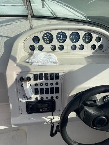 1992 Regal Ventura boat dashboard with gauges and controls.