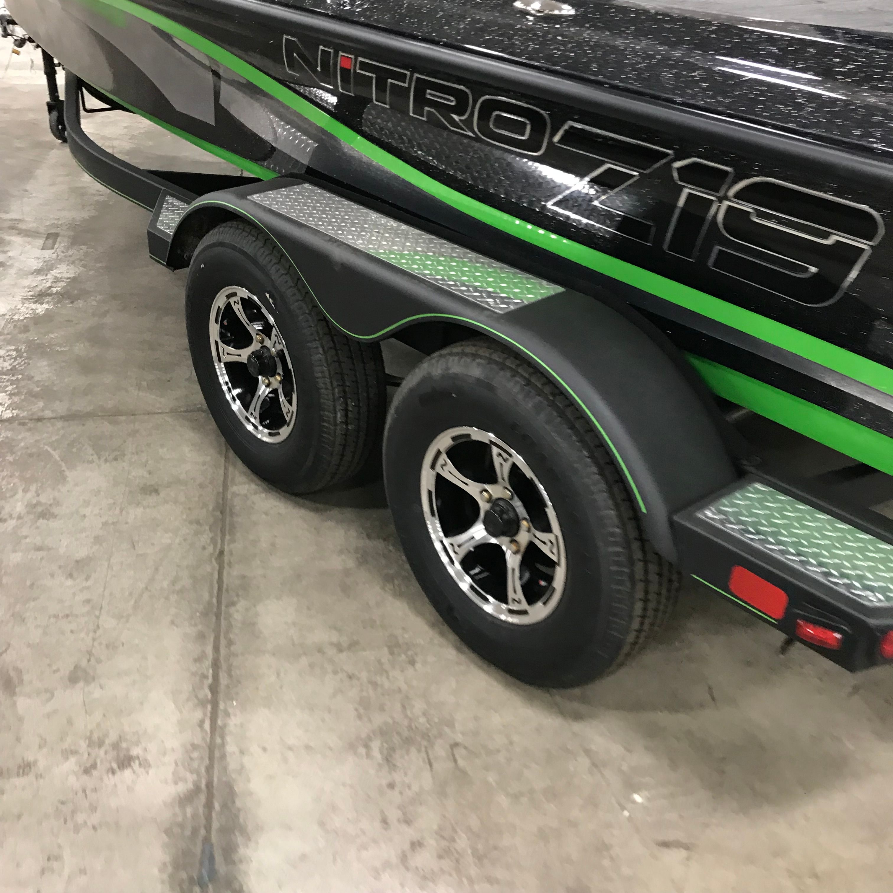 2018 Nitro Z19 Pro boat on trailer in a garage.