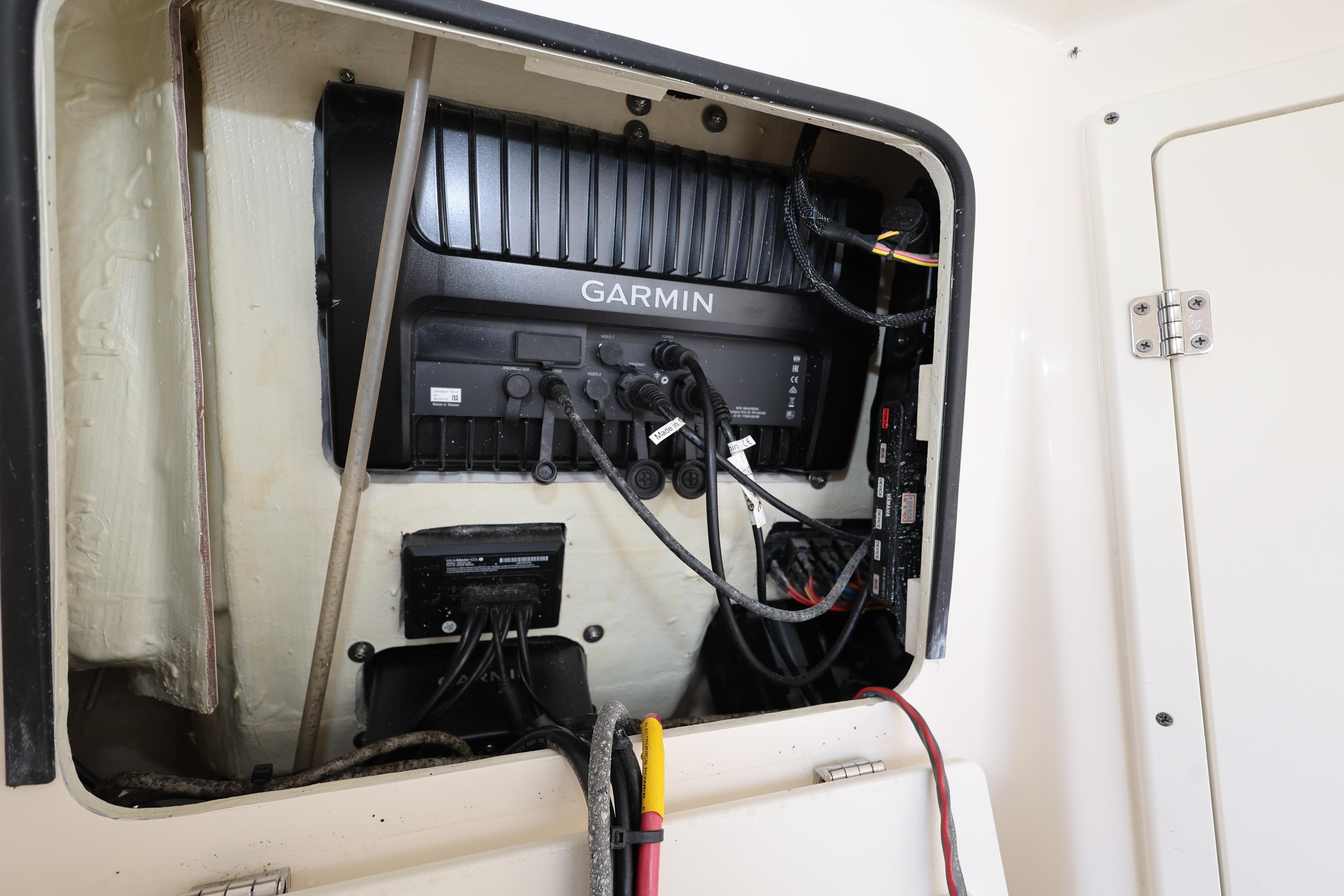 Interior view of a 2019 Cobia 320 Center Console with Garmin electronics installed.