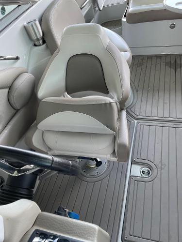 2019 Crownline E255 boat interior with gray seating and steering wheel.
