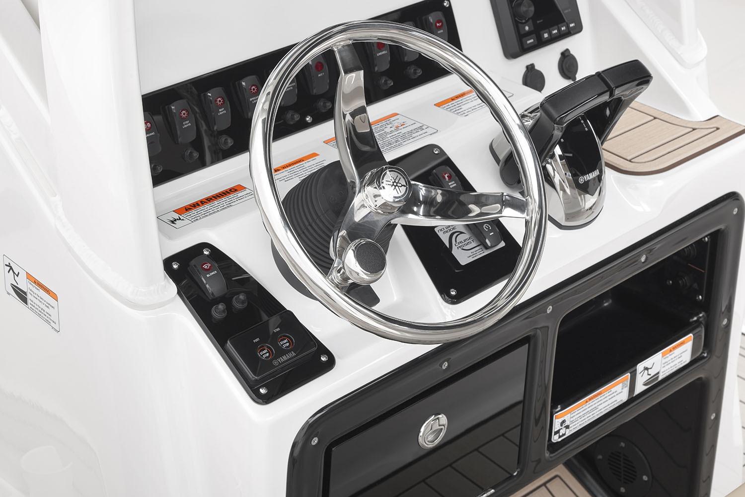 Manufacturer Provided Image: 2026 Yamaha Boats 222 FSH Sport E dashboard with steering wheel and controls.