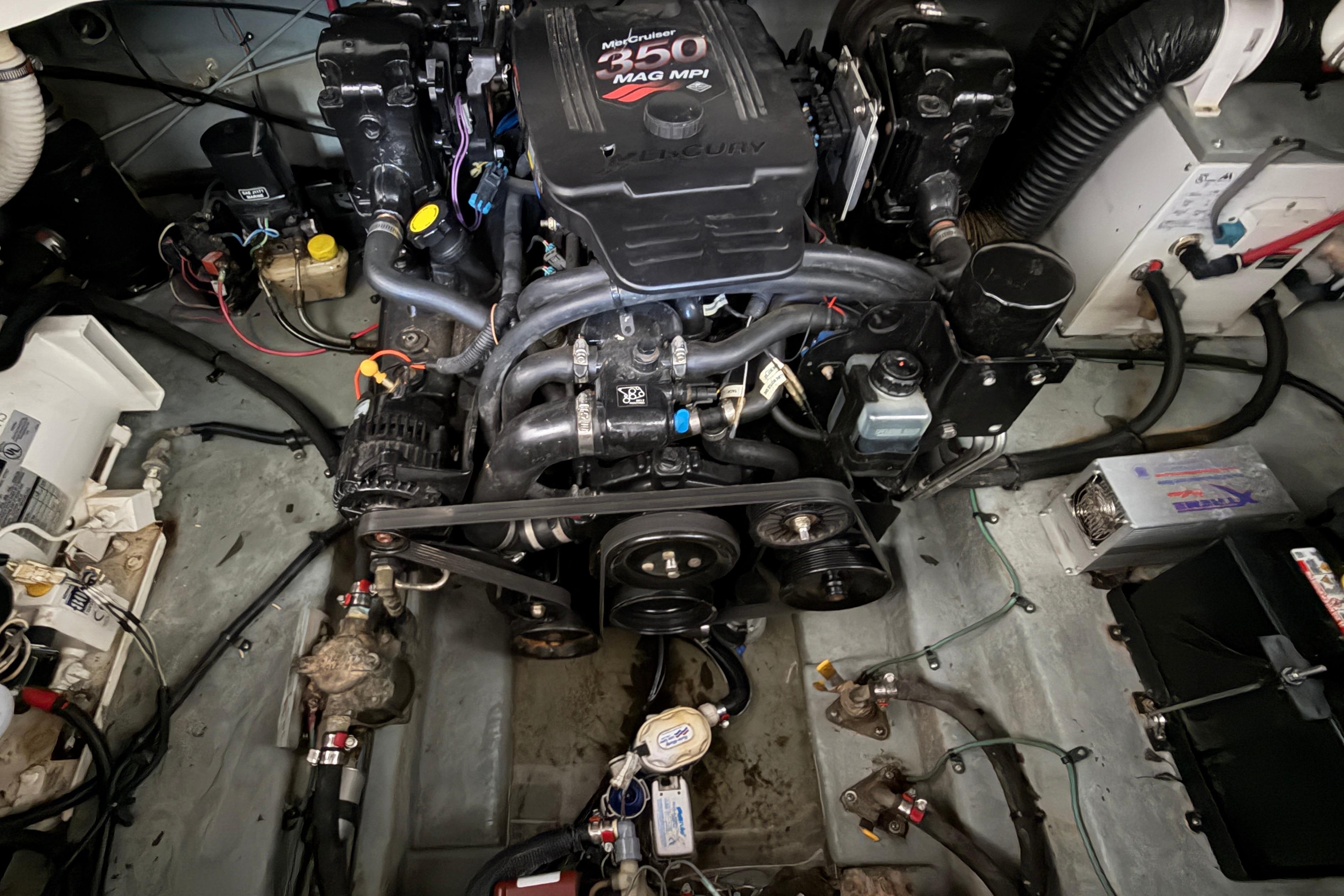 Engine compartment of a 2004 Sea Ray Sundancer 260 with MerCruiser 350 MAG MPI engine.