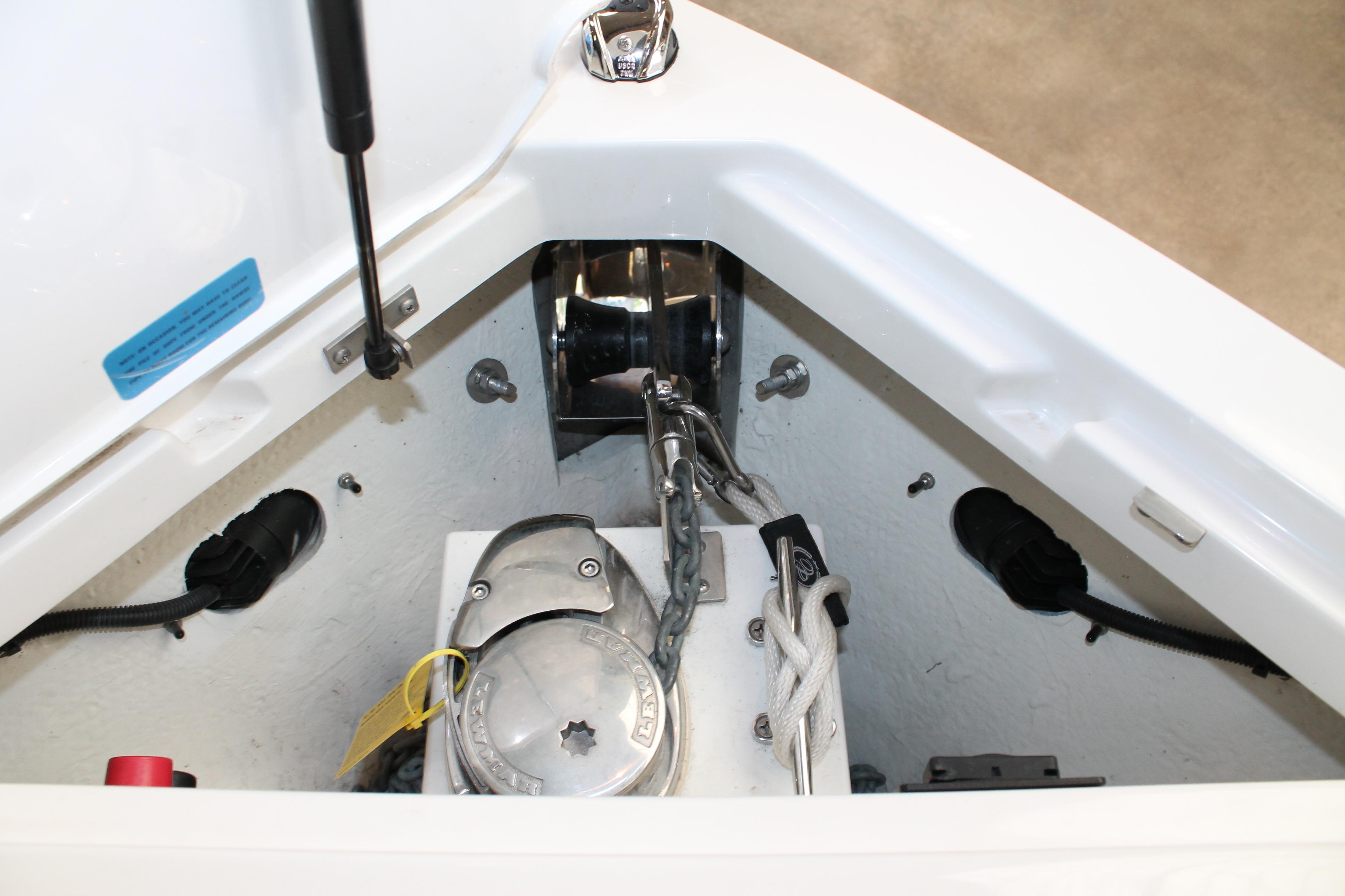 Anchor compartment of 2023 Cobalt R8 boat with winch and chain.