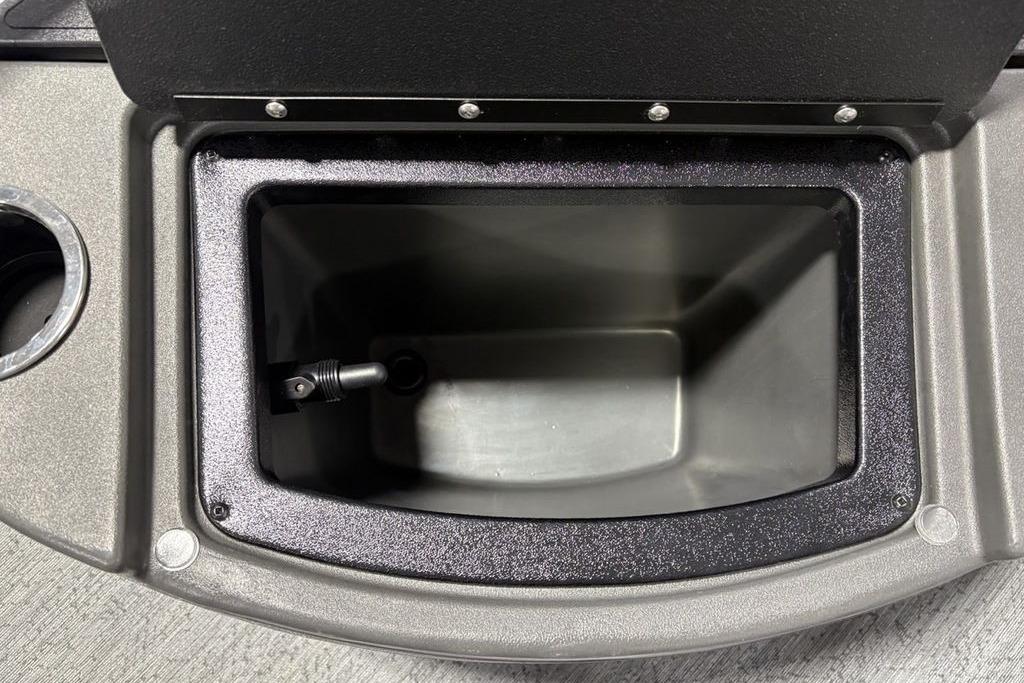 Open storage compartment on 2026 Sun Tracker Bass Buggy 18 DLX boat.