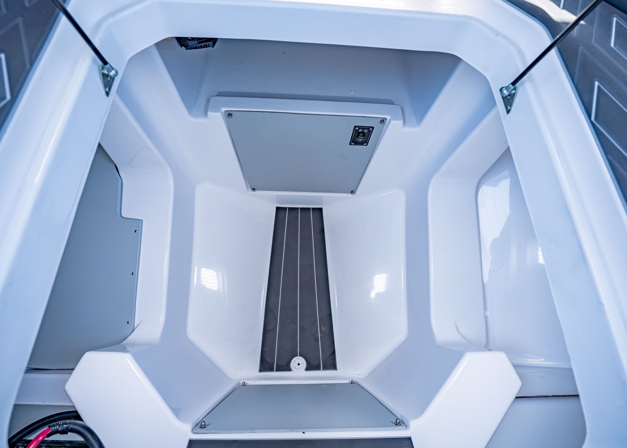 Interior of Paradigm 266 SL SURF boat, model year 2025.