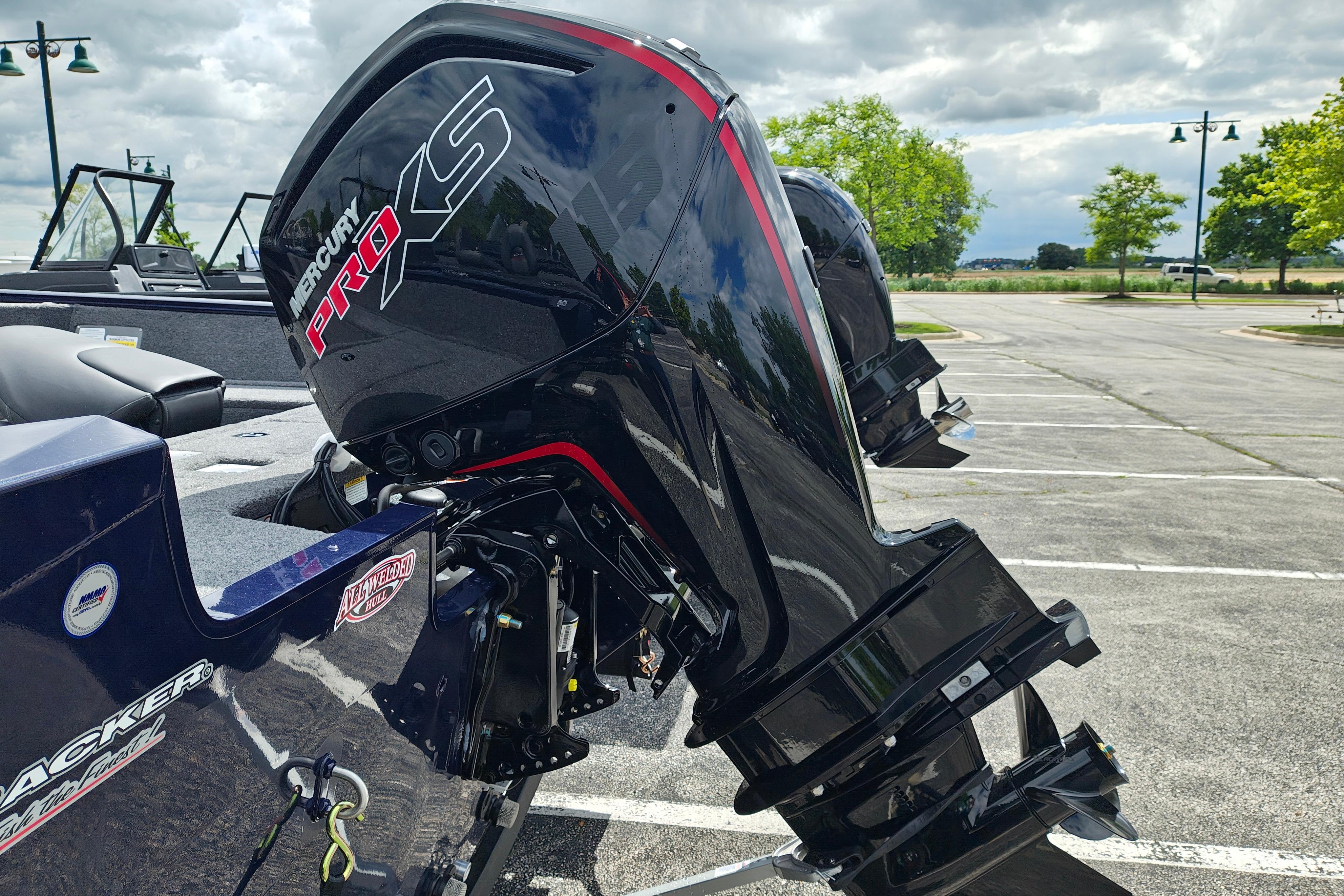 2026 Tracker Pro Guide V-175 WT with Mercury Pro XS engine in a parking lot.