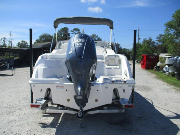 2025 Sea Fox 228 Traveler boat with 250 V6 engine, parked outdoors.