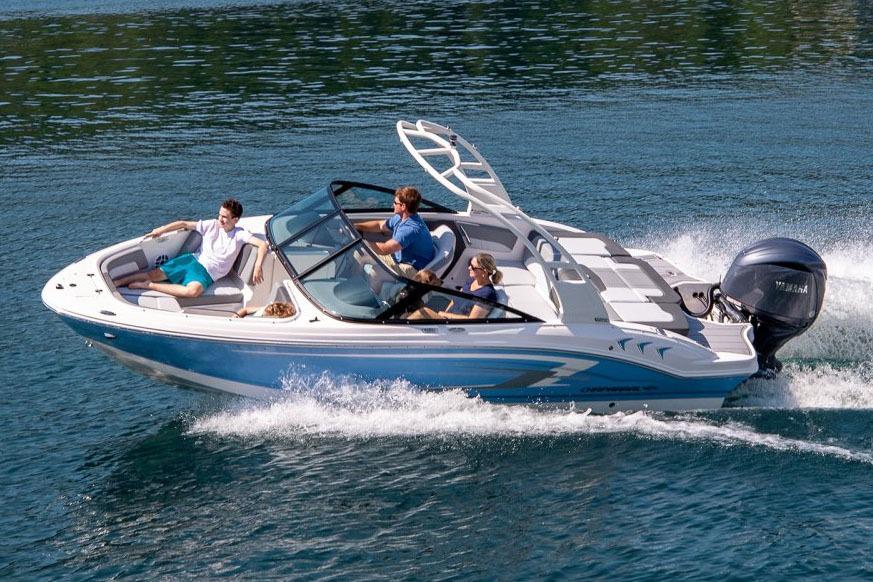 Manufacturer Provided Image: 2026 Chaparral 21 SSi OB boat cruising on a clear blue lake with passengers.