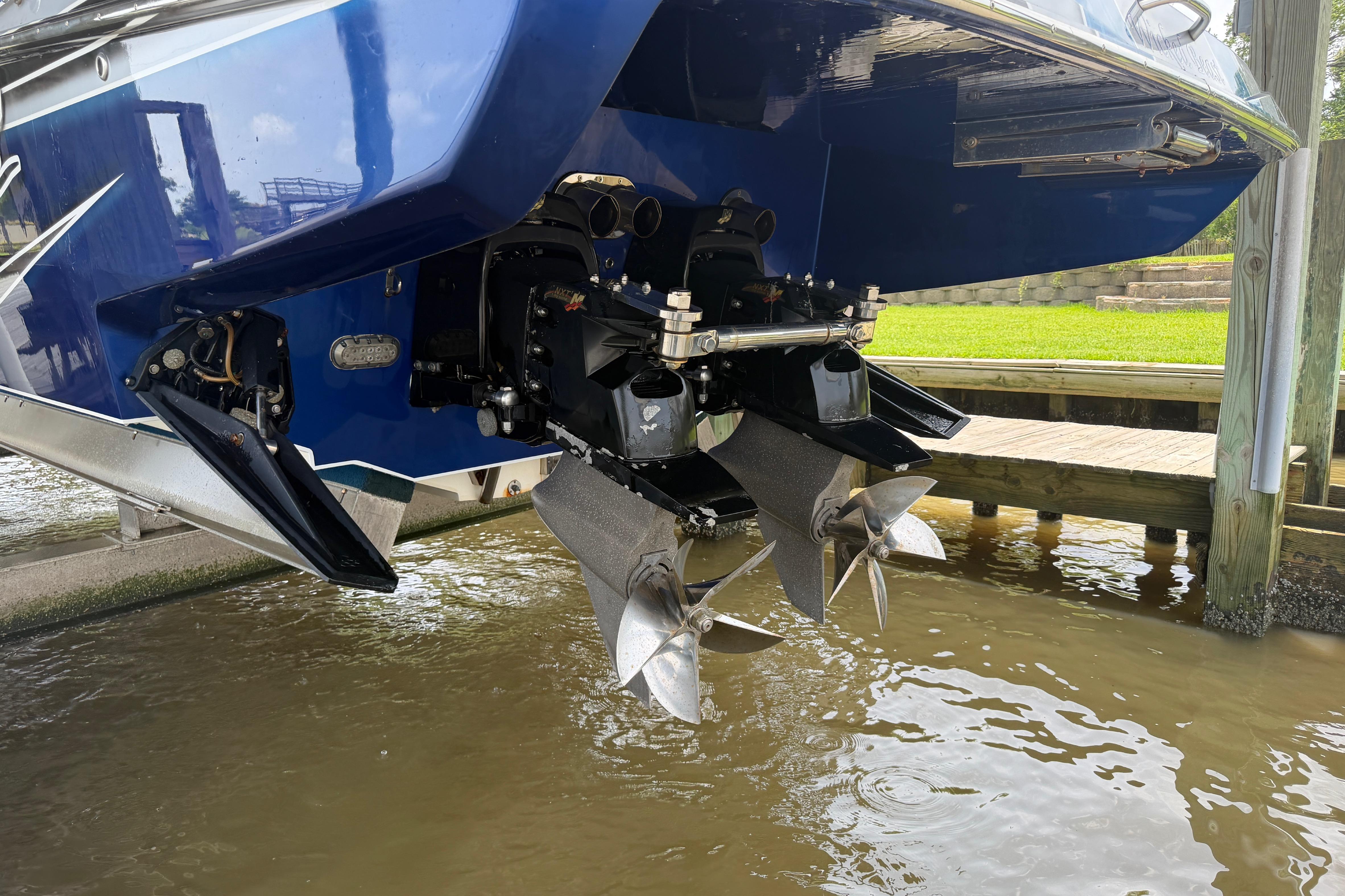 2013 Nor-Tech 477 SPX Vee Bottom boat with dual propellers in water.
