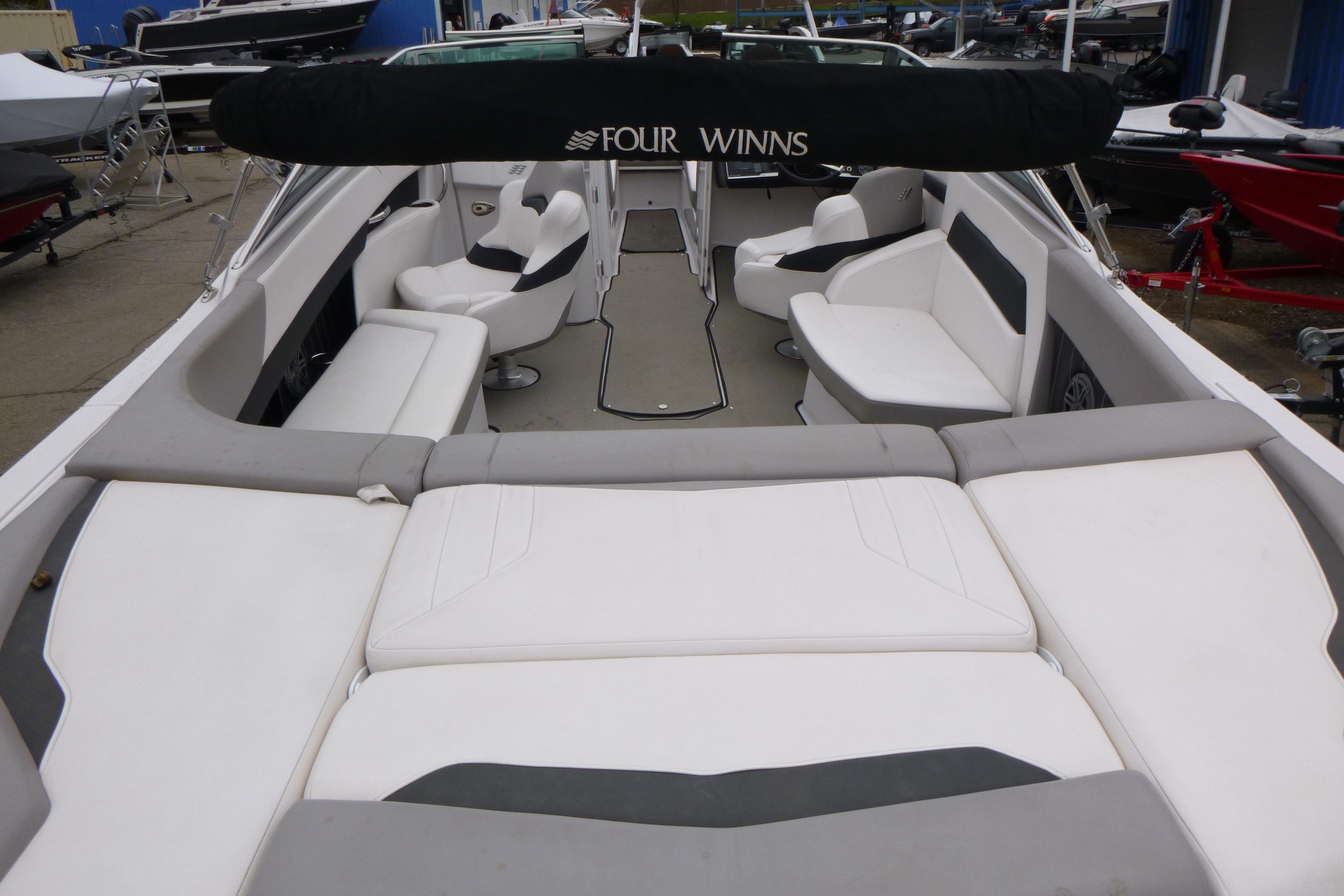 2017 Four Winns H260 boat interior with spacious seating and sleek design.
