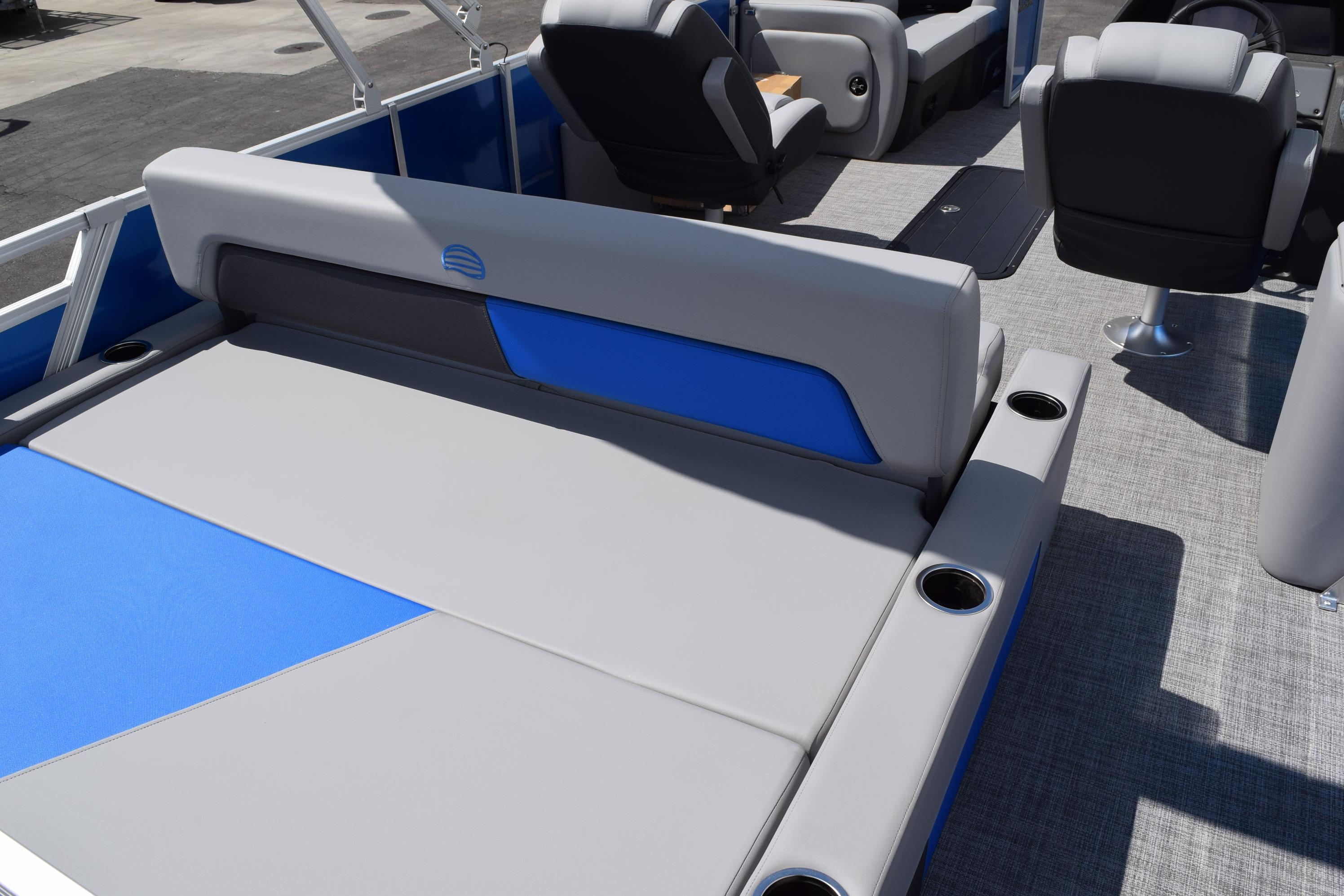 2026 Sun Tracker Party Barge 22 RF XP3 interior with gray and blue seating.