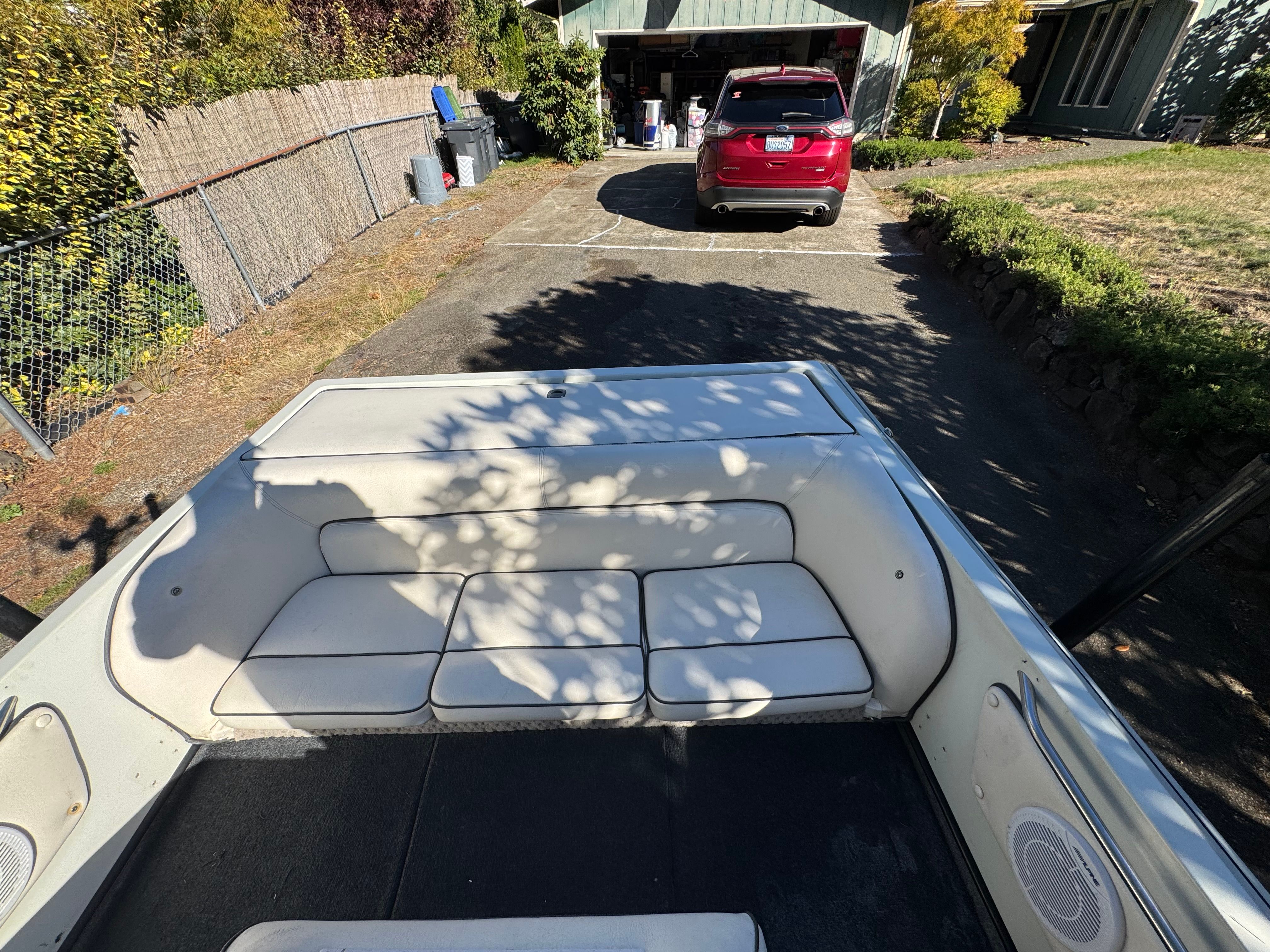 Interior of a 1990 Supra TS6M boat with white seating.