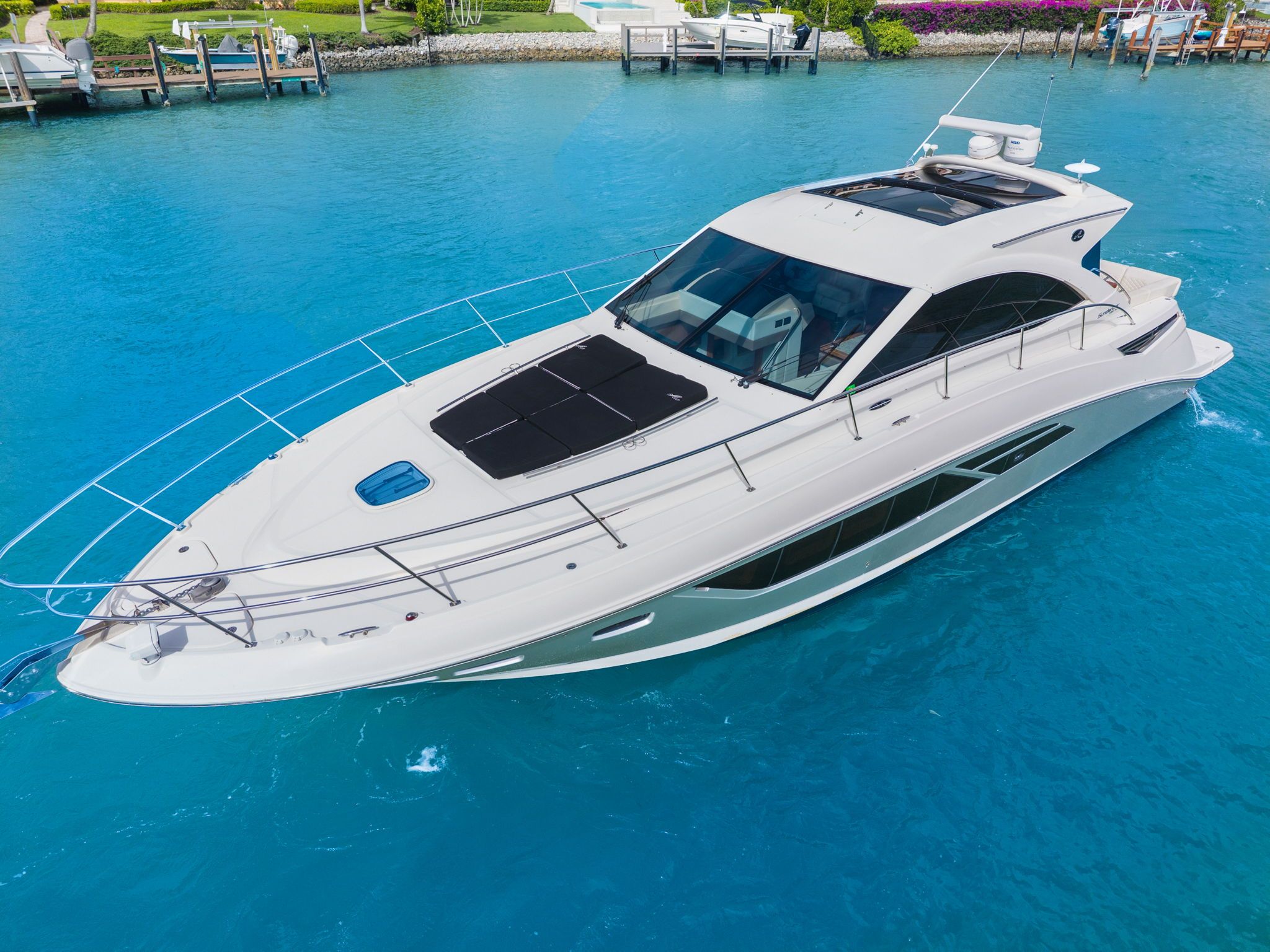 2017 Sea Ray Sundancer 510 on clear blue water.
