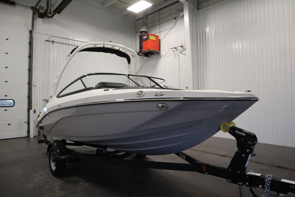 2026 Yamaha Boats 195S in a showroom, showcasing sleek design and modern features.