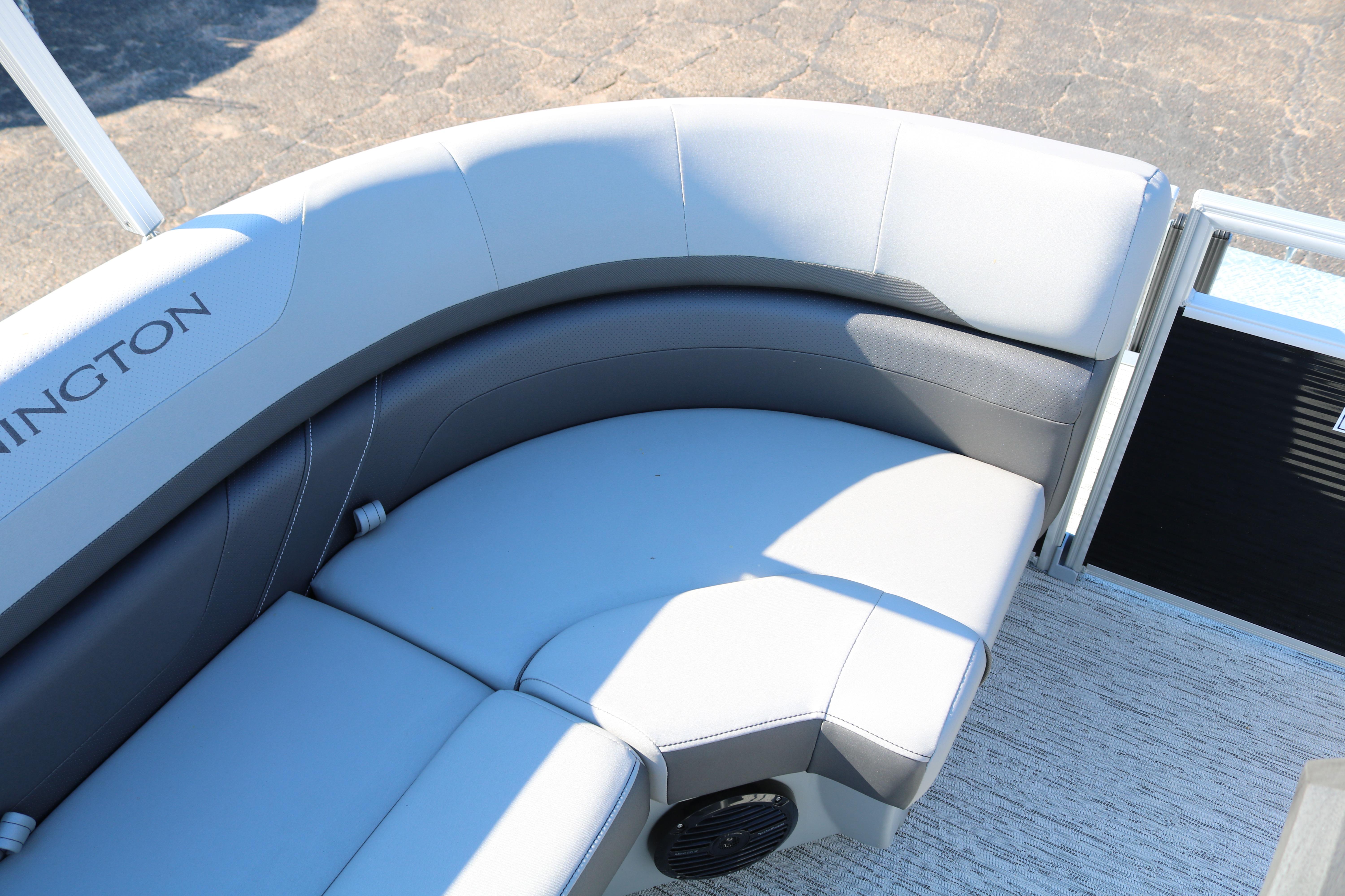 2026 Bennington 22SX Stern Radius boat seating, featuring sleek gray upholstery.