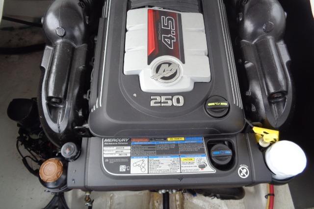 Engine of 2019 Monterey 218SS Super Sport boat, featuring Mercury 4.5L 250 horsepower.