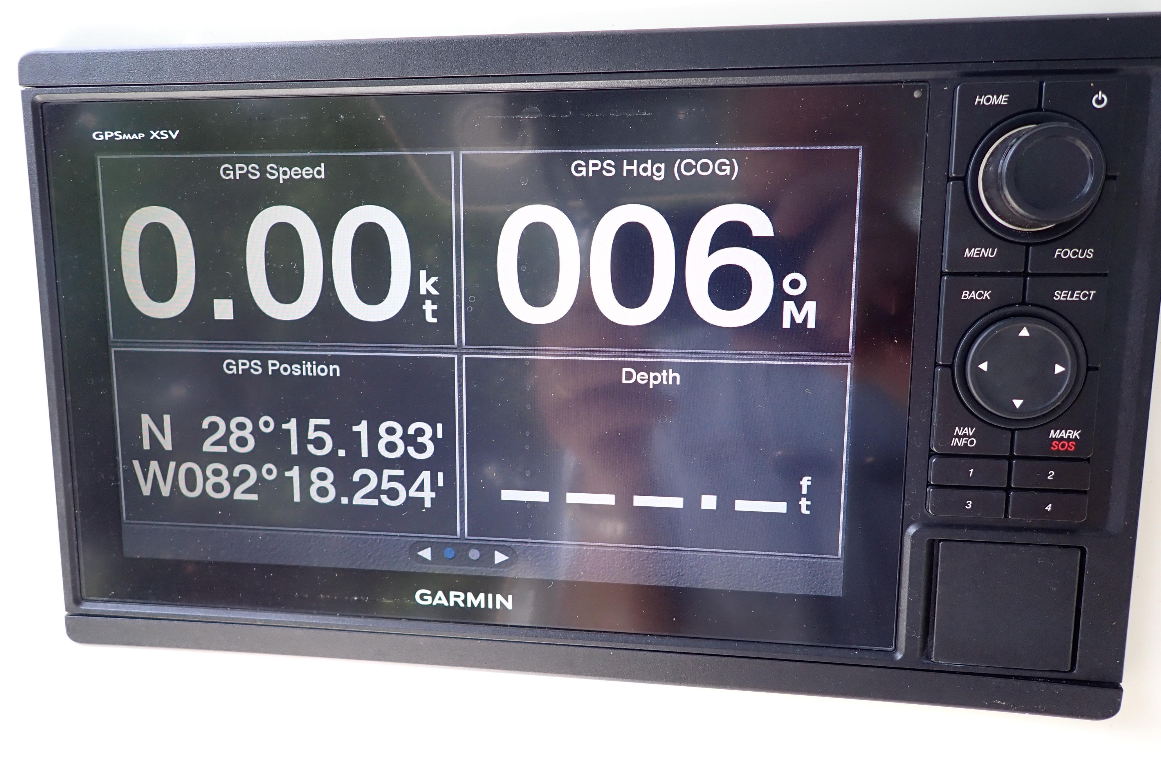 Garmin GPS display on 2019 Key West 263 FS boat showing speed, heading, and coordinates.