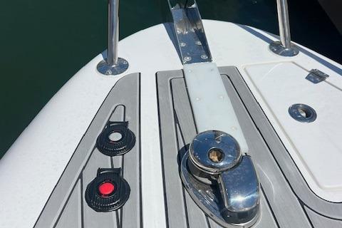 2024 Bracewell 25 boat deck with cleats and winch, featuring sleek design elements.