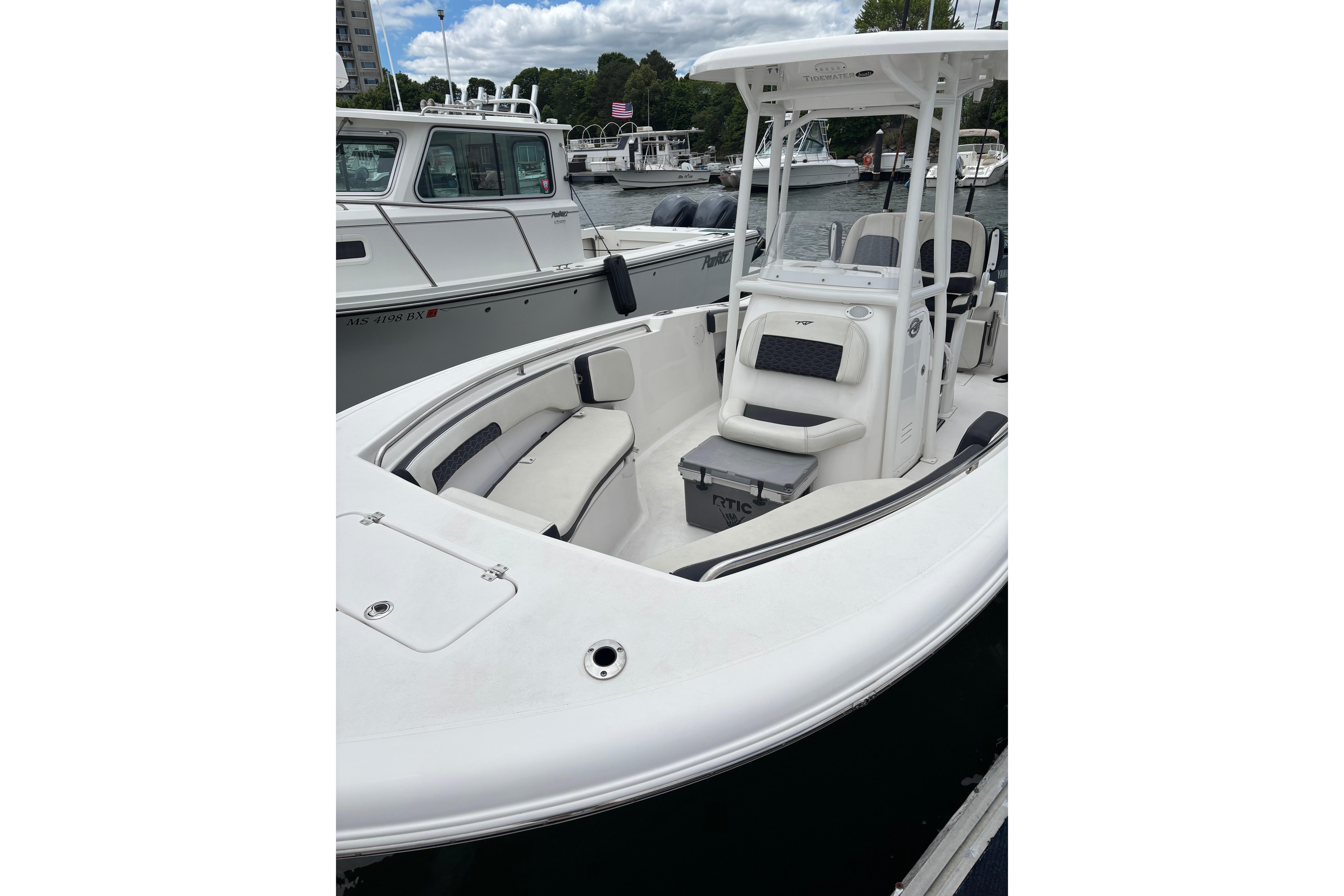 2024 Tidewater 220 CC Adventure boat with sleek design, spacious seating, and modern features.
