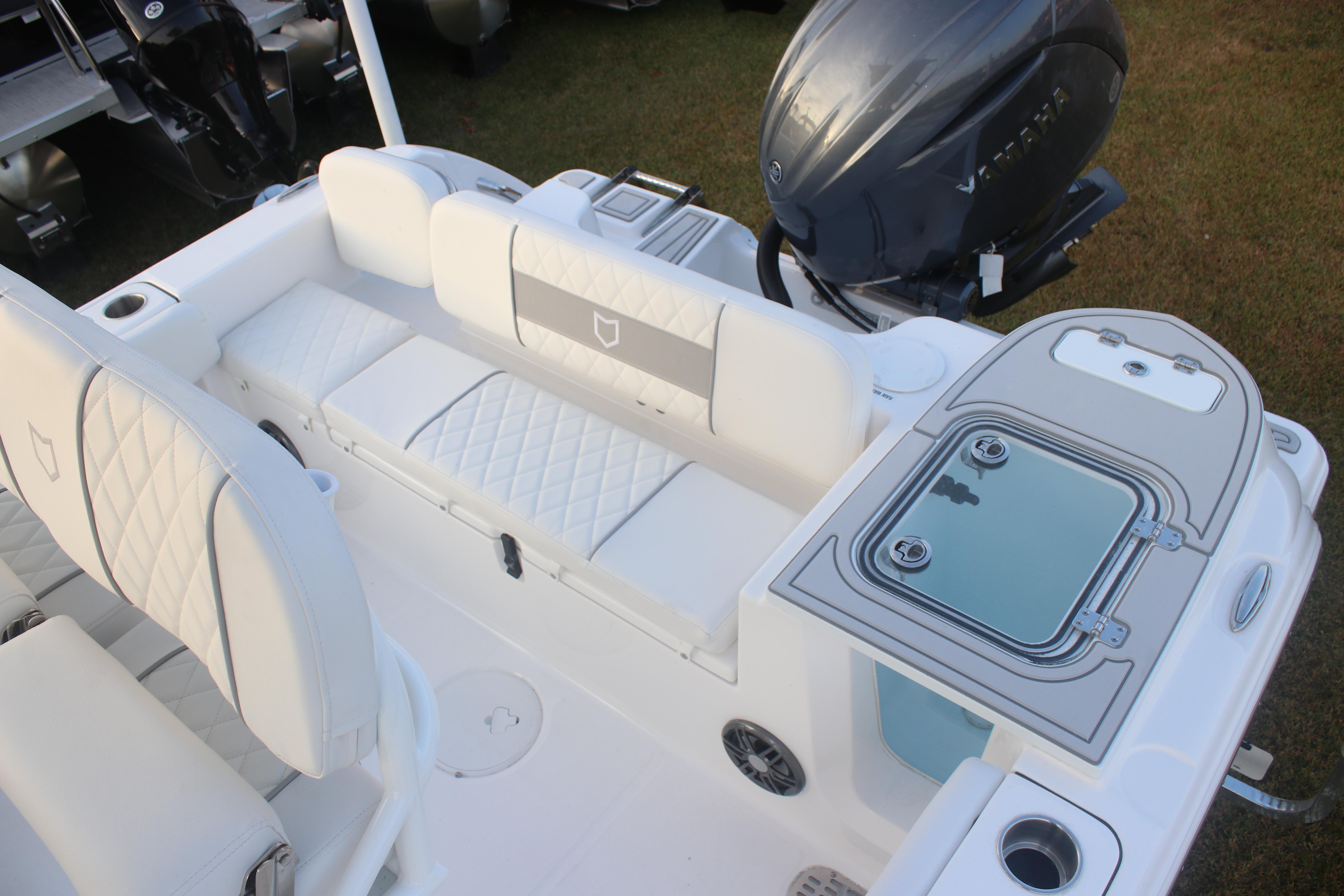2026 Sea Fox 228 Commander boat interior with seating and Yamaha outboard engine.